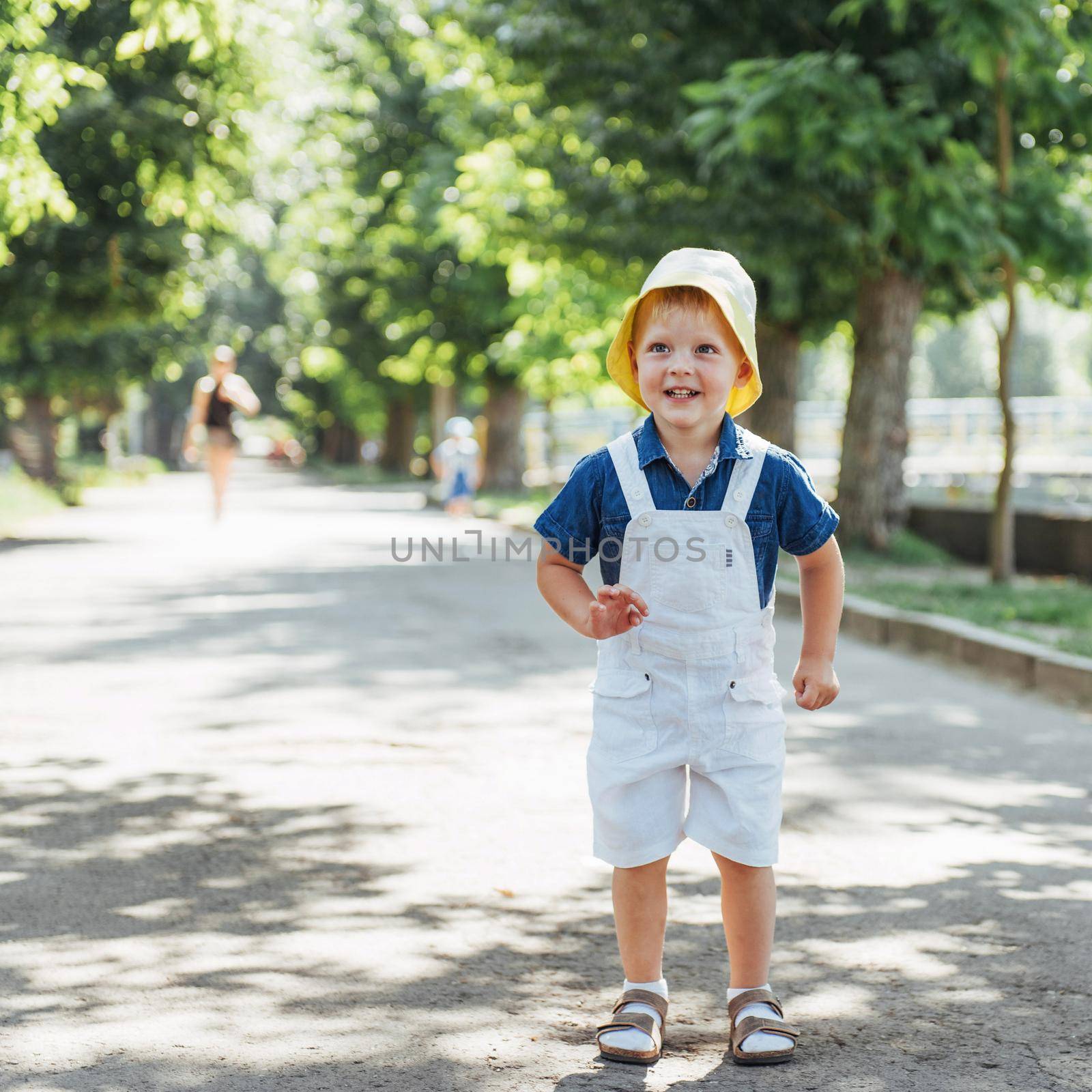 Cute boy posing for photo outdoors. Ukraine Europe.