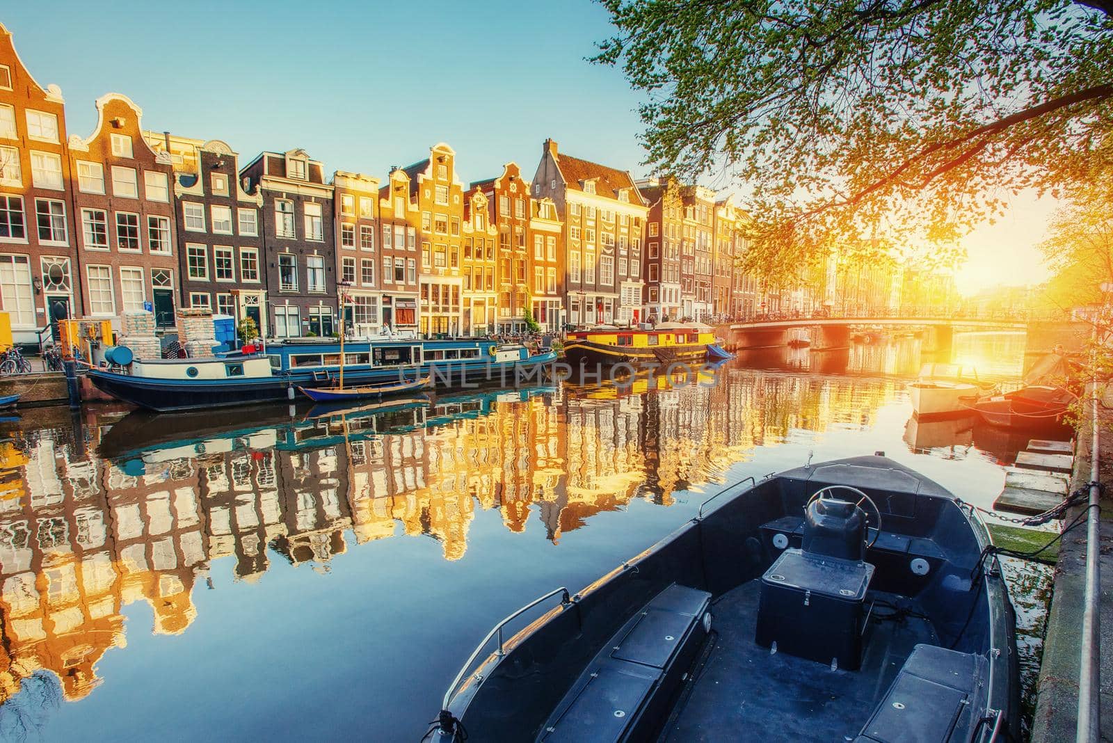 Canal at sunset. Amsterdam is the capital and most populous city in Netherlands.