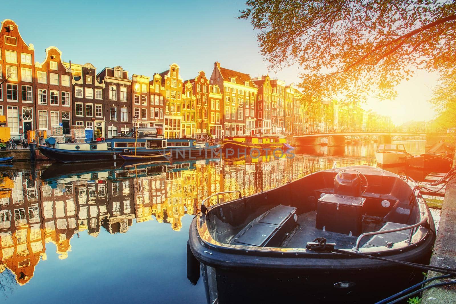 Canal at sunset. Amsterdam is the capital and most populous city in Netherlands.