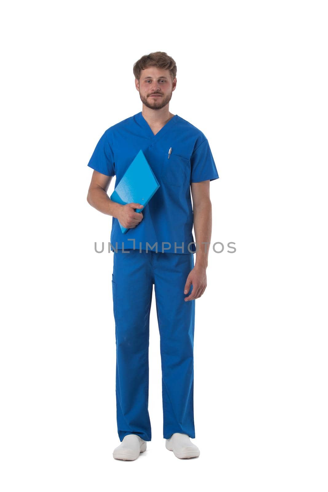 Male nurse or doctor in blue uniform studio full length portrait isolated on white background