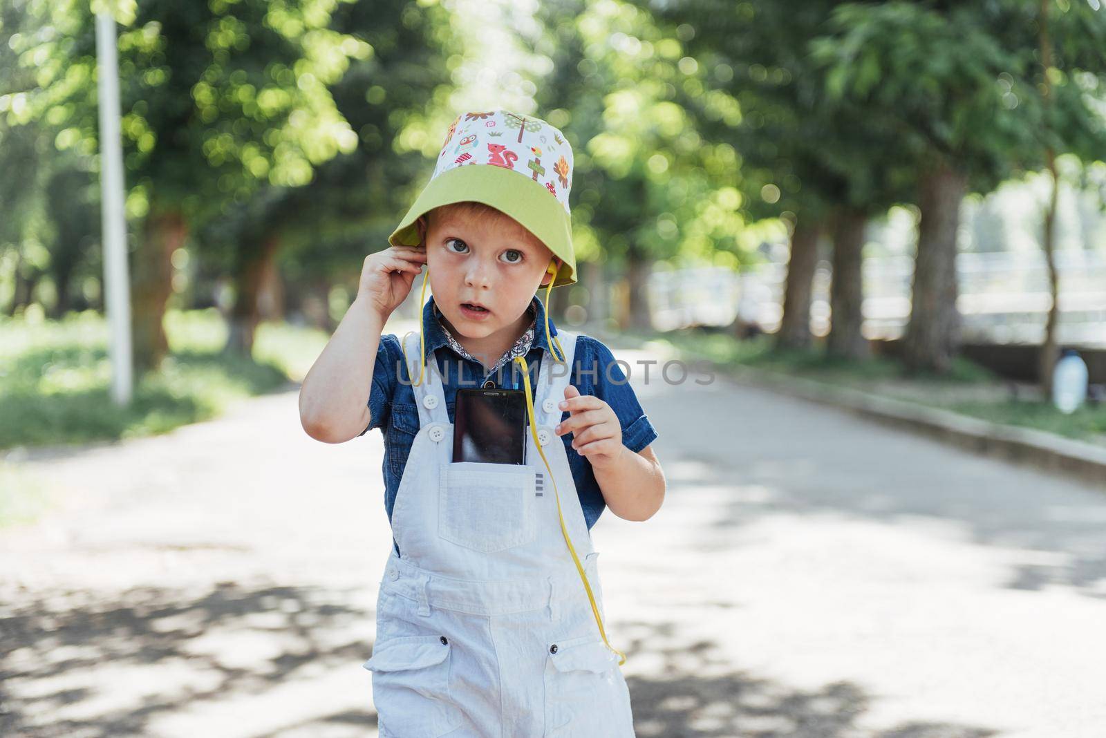 Cute boy posing for photo outdoors. Ukraine. Europe