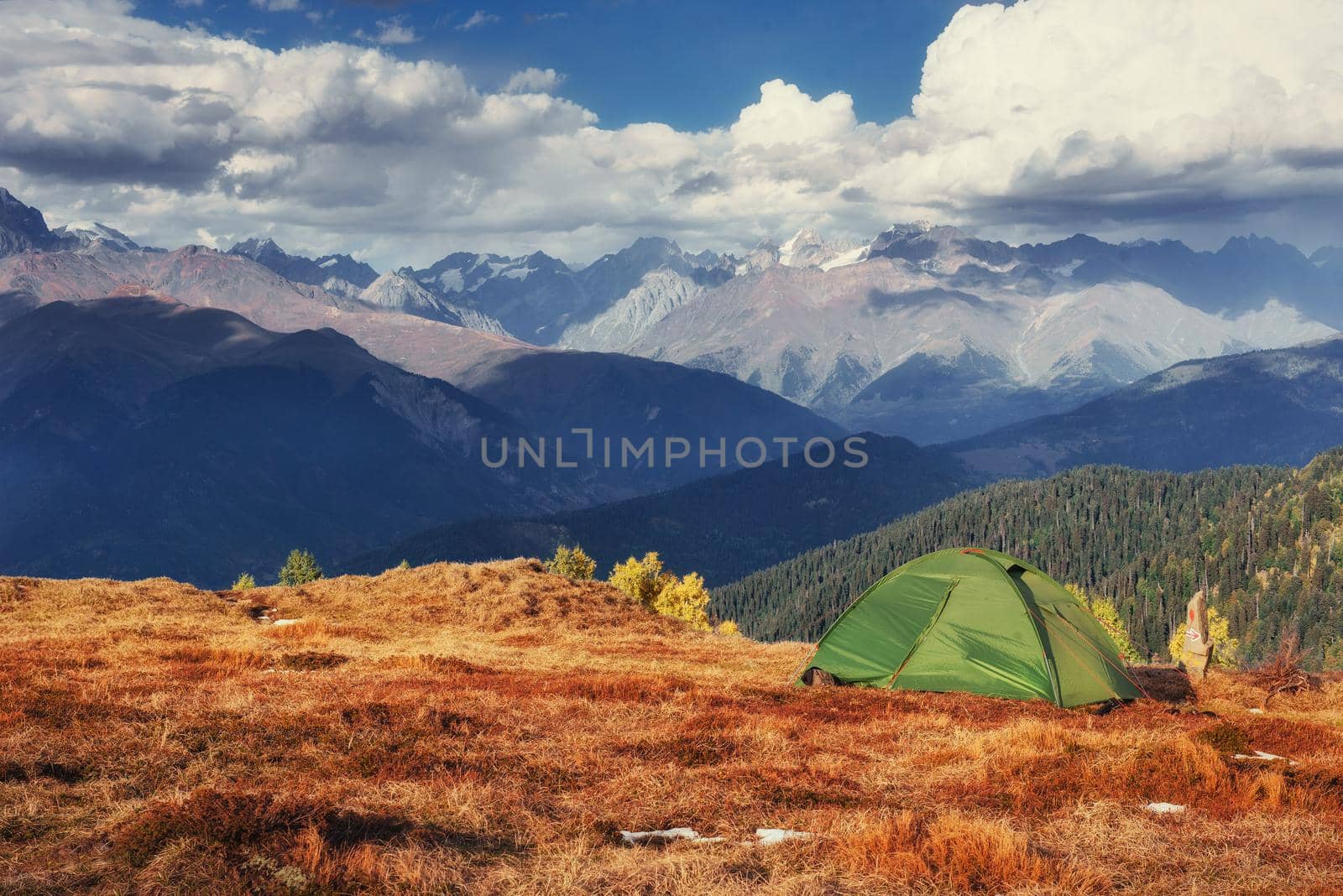 Tent green spread out on the pass Goulet. Georgia, Svaneti. Europe. Caucasus Mountains.