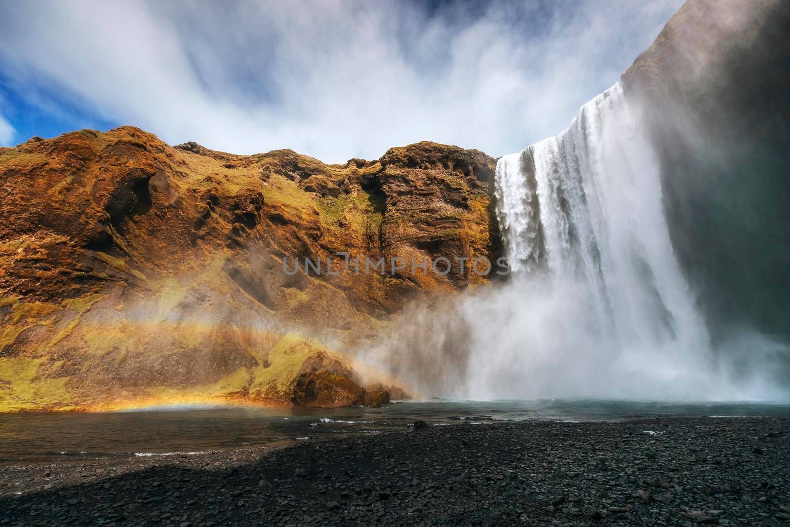 Great waterfall Skogafoss in south of Iceland near the town of Skogar. Colorful rainbow color.