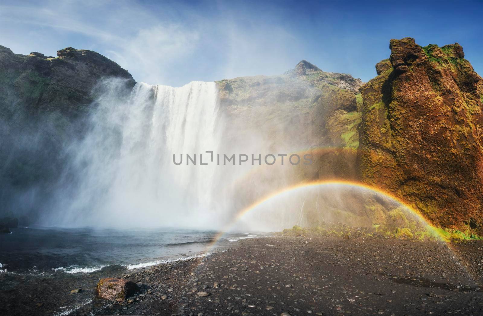 Great waterfall Skogafoss in south of Iceland near the town of Skogar. Colorful rainbow color.