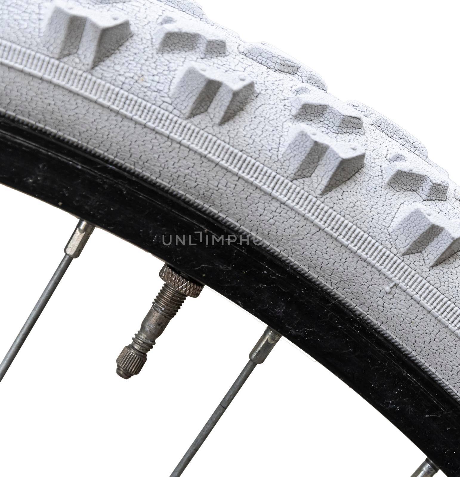 Close up on bicycle wheel air valve, nipple, isolated in white background