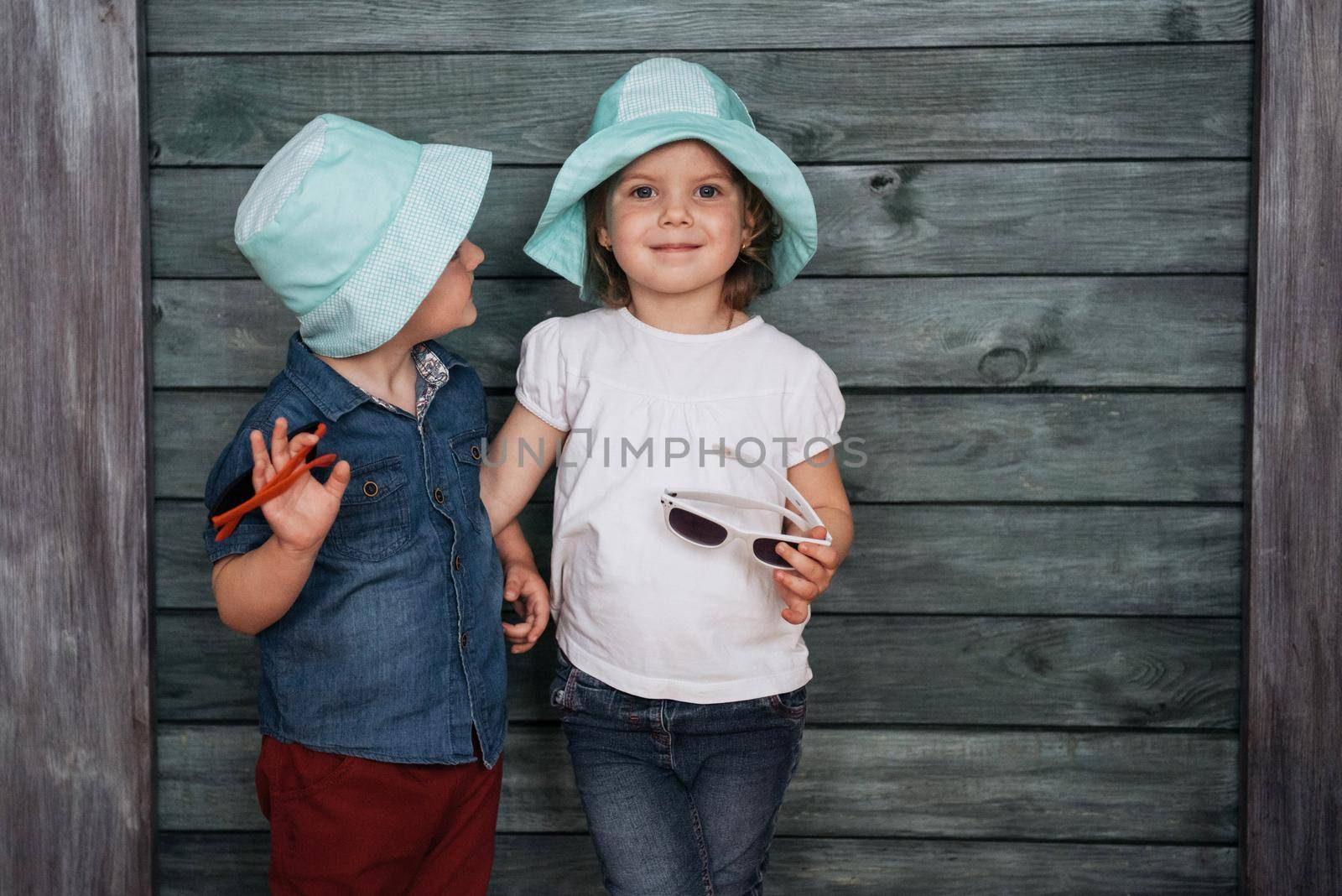 Happy young children siblings. Beautiful exhibition. Ukraine Europe