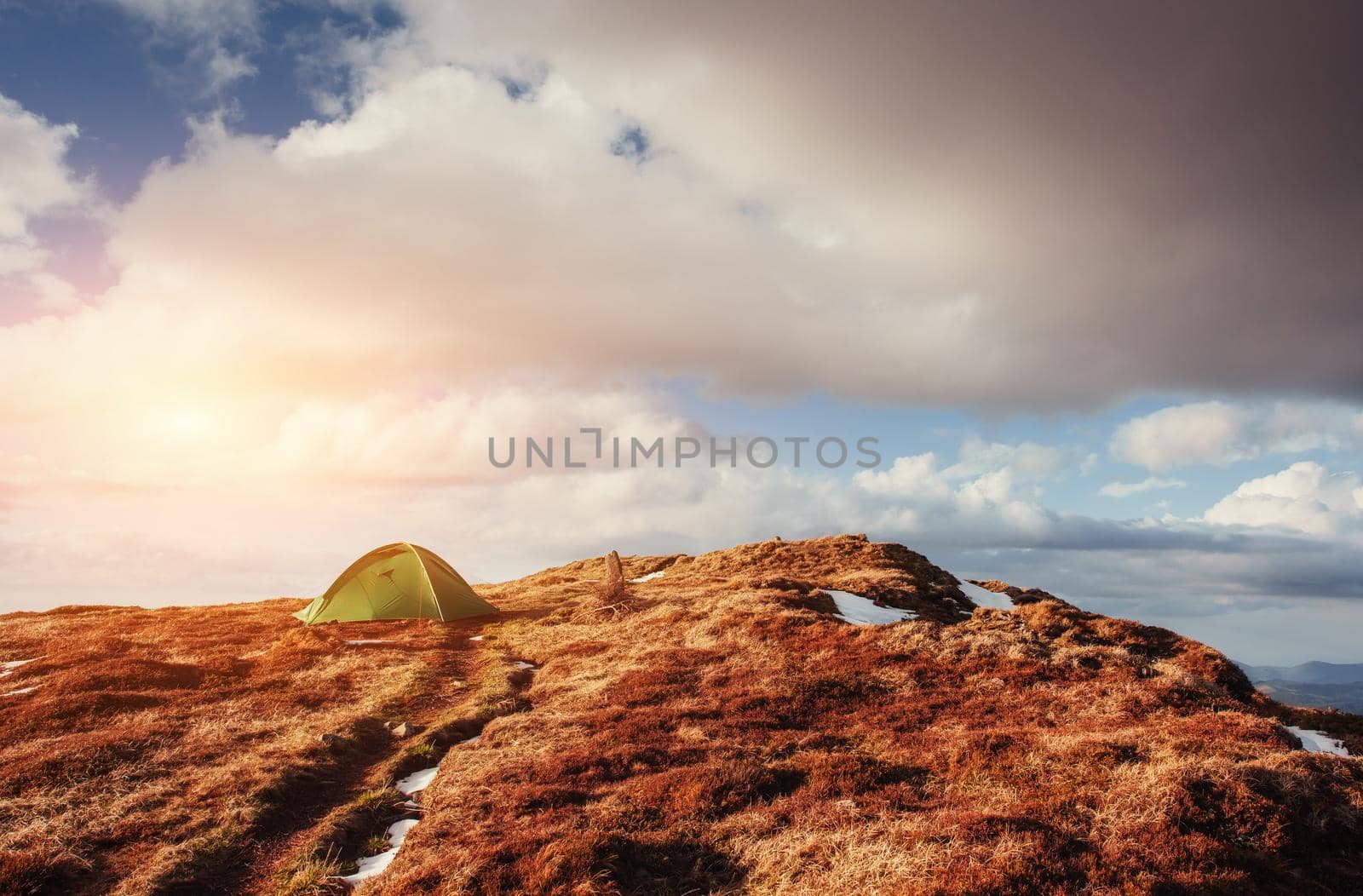 Tourist tent in the mountains in spring.