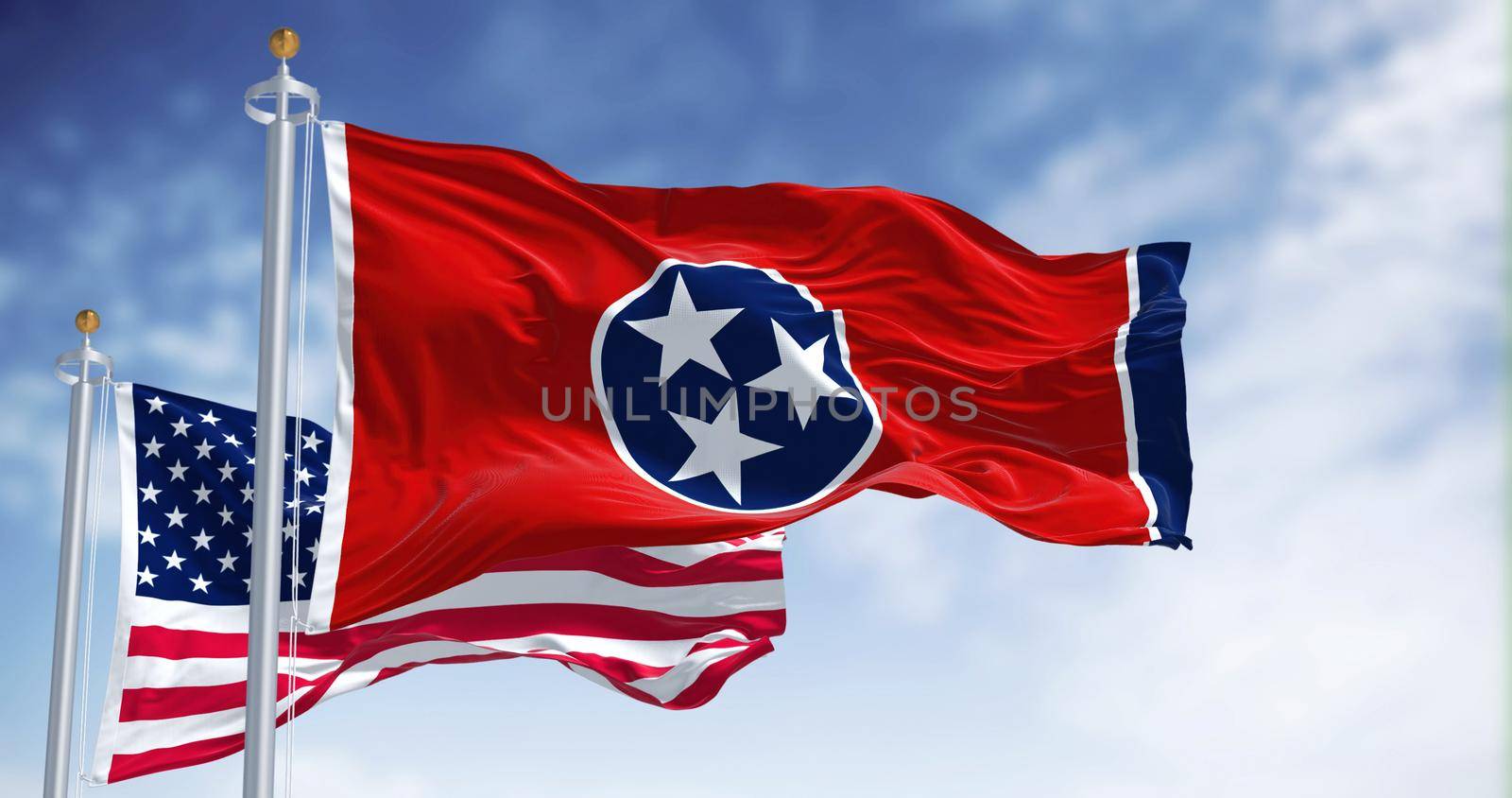 The Tennessee state flag waving along with the national flag of the United States of America by rarrarorro