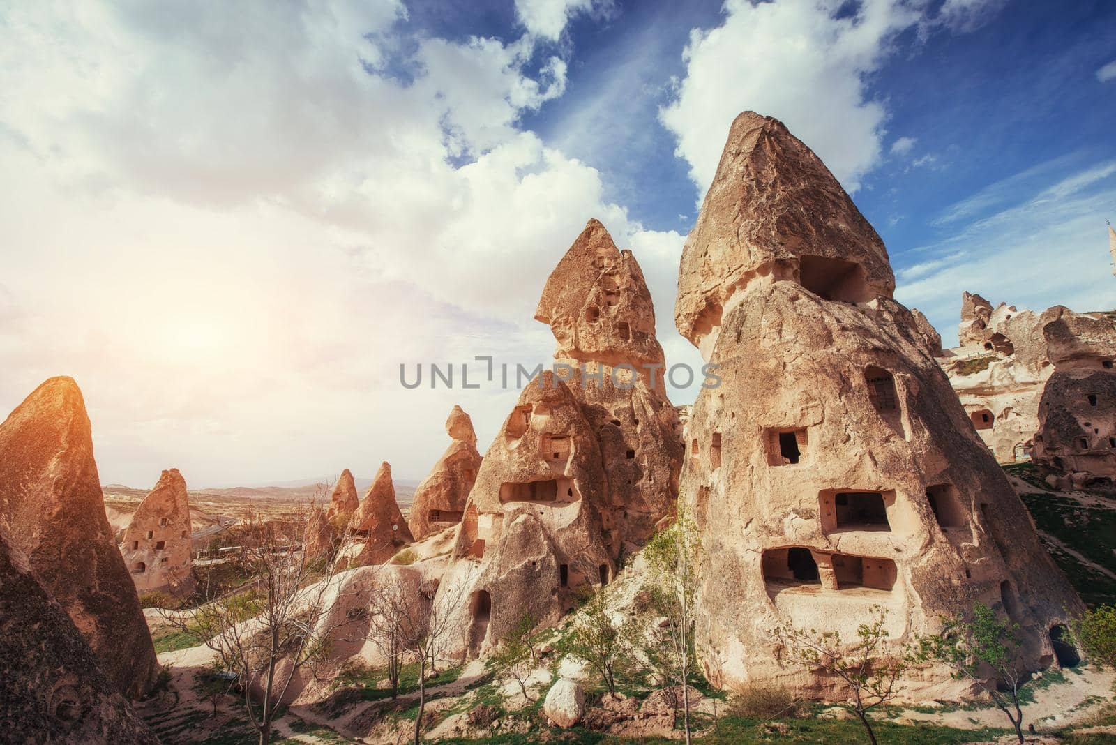 Review unique geological formations in Cappadocia, Turkey. Kappadokiets region, with its valleys, gorges, hills, located between the volcanic mountains in Goreme National Park.