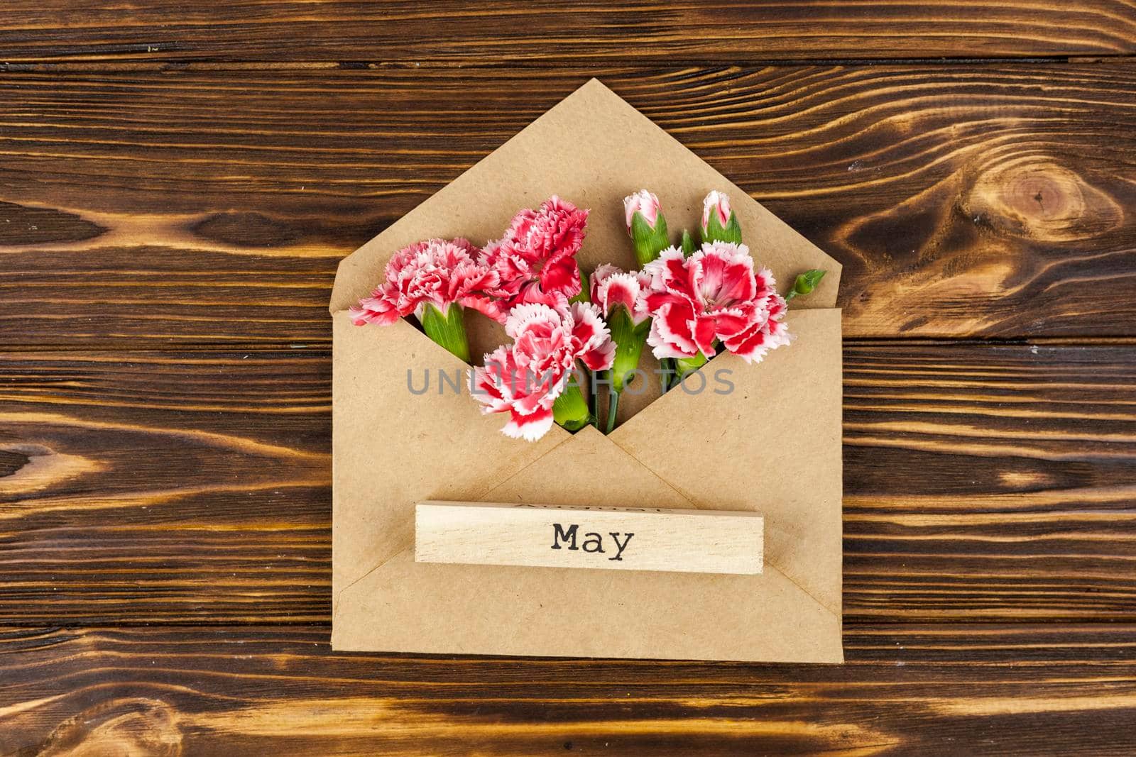 may text wooden block envelope with red carnation flowers