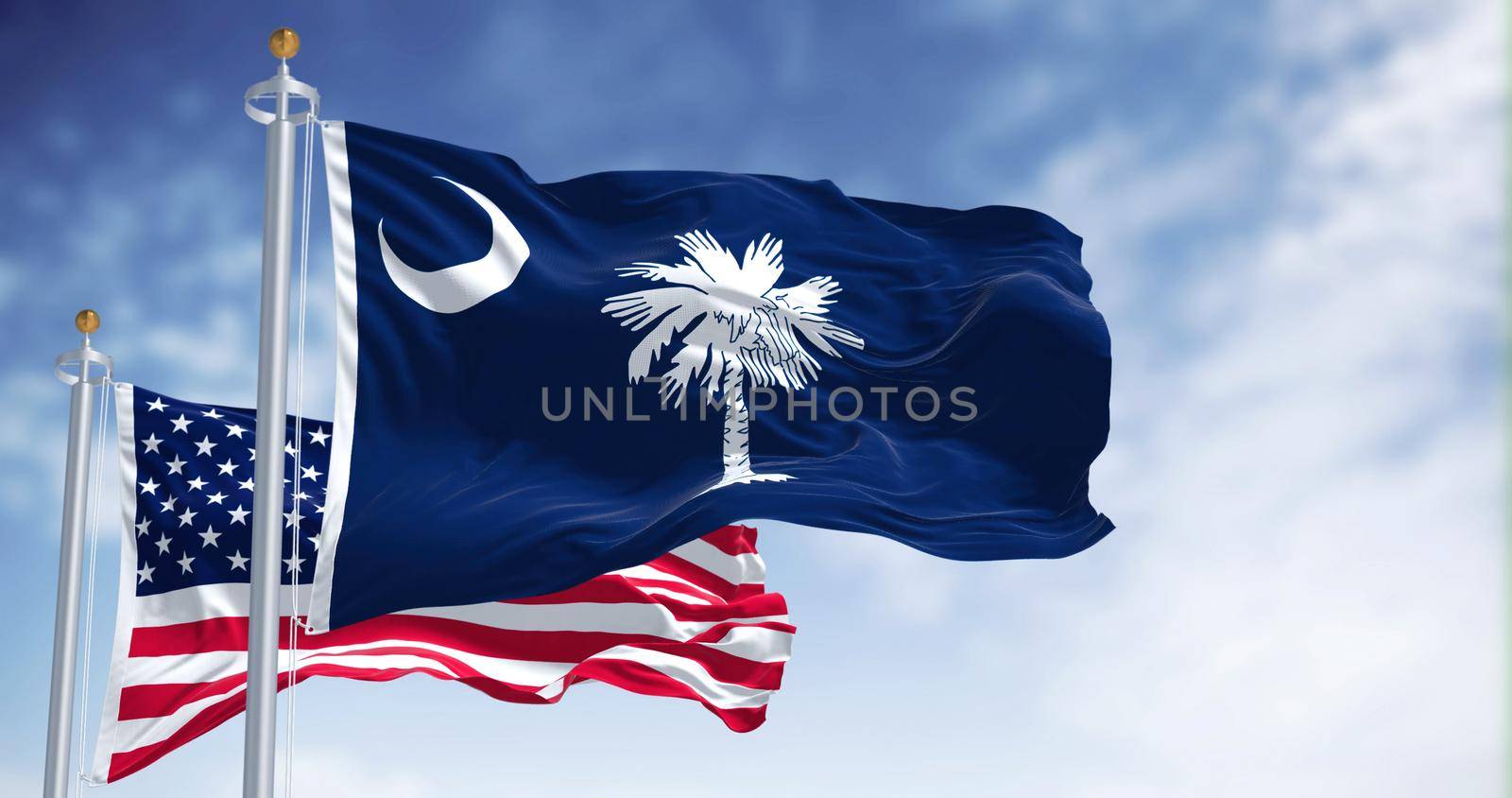 The South Carolina state flag waving along with the national flag of the United States of America by rarrarorro