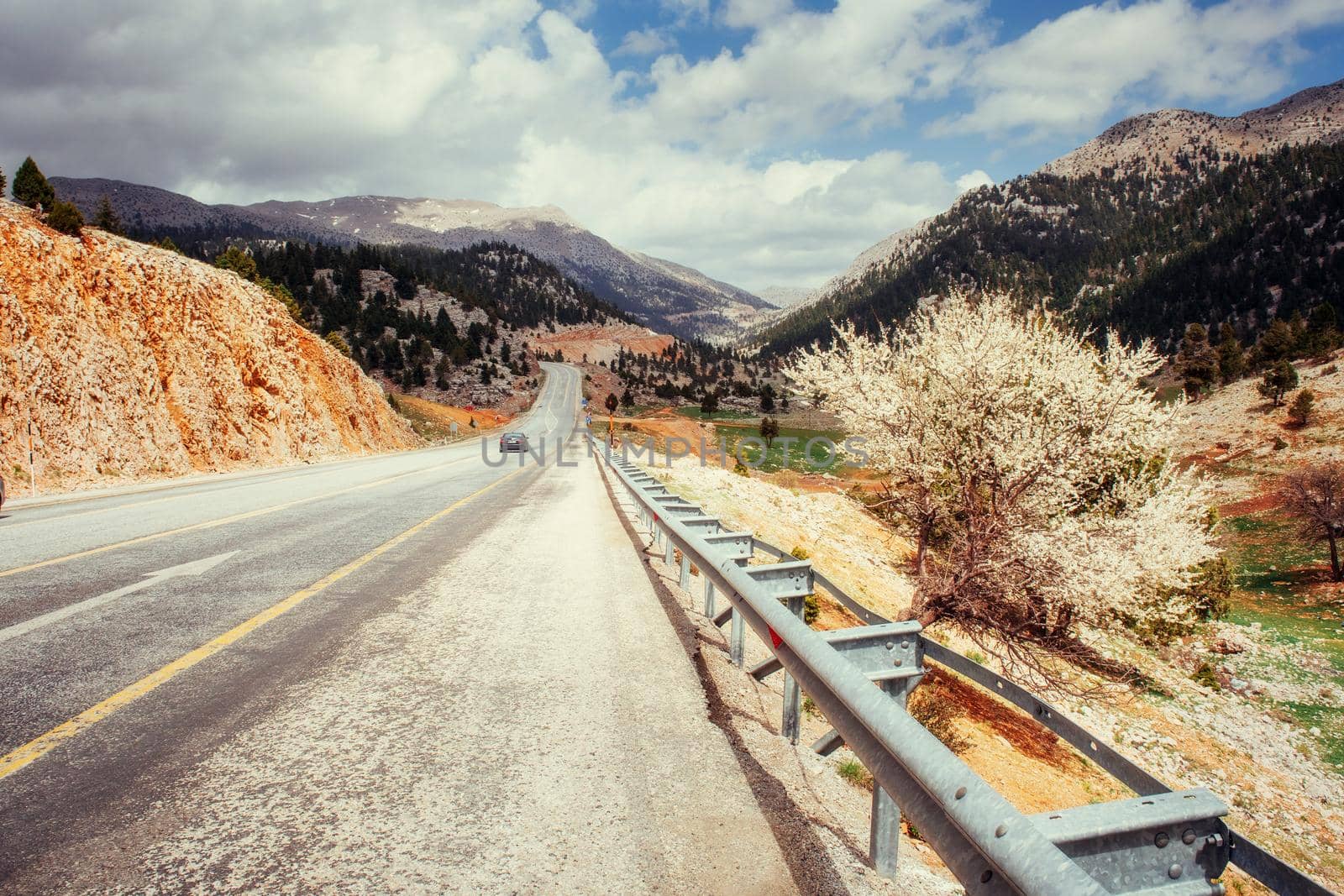 beautiful scenic highway in mountains. Car rides on asphalt surfaces