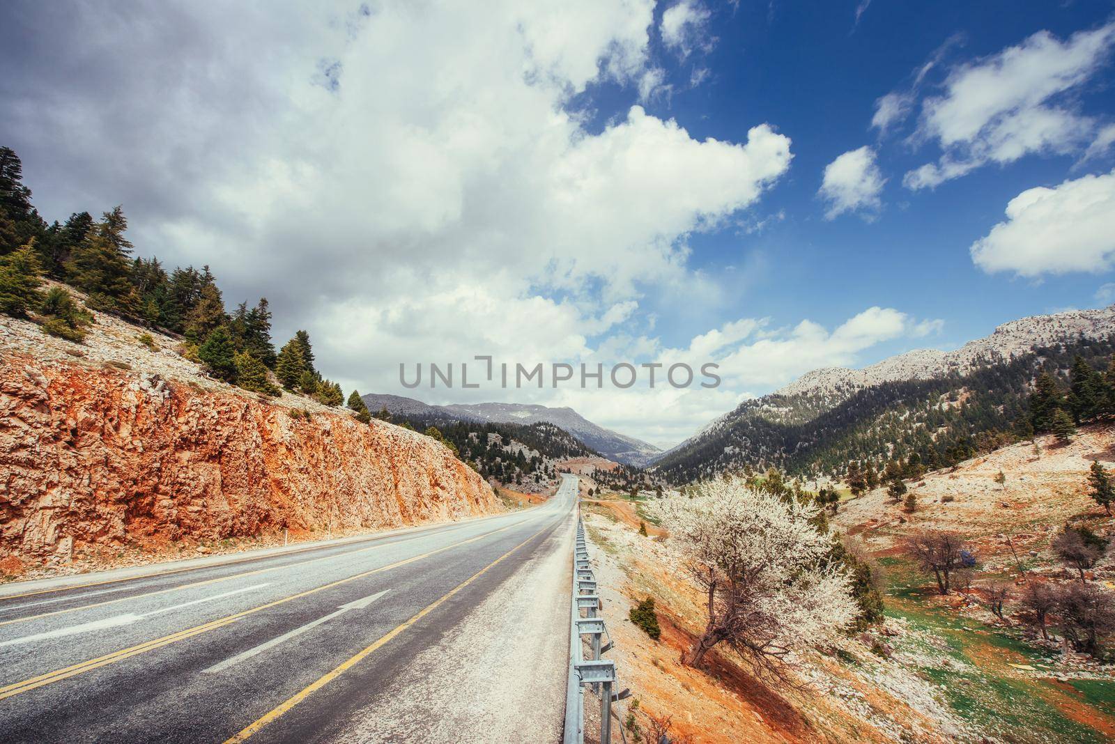 View of a beautiful asphalt road that video to the mountains.