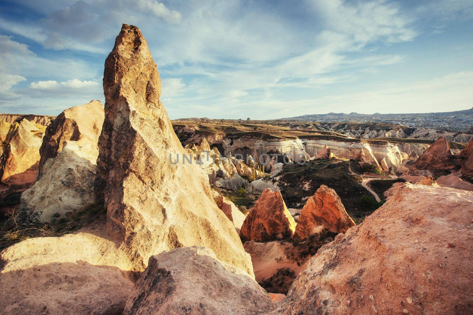 TUnique geological formations in valley in Cappadocia.
