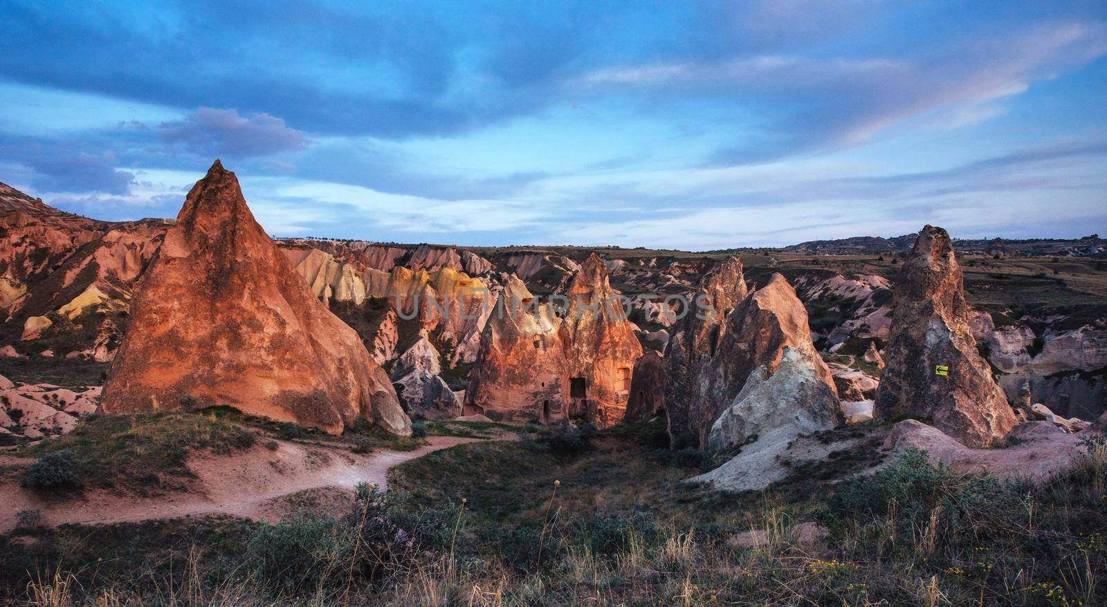 TUnique geological formations in valley in Cappadocia.