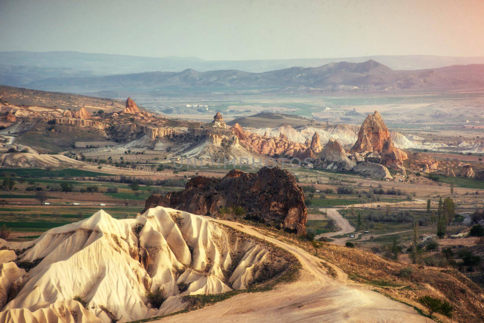 TUnique geological formations in valley in Cappadocia.