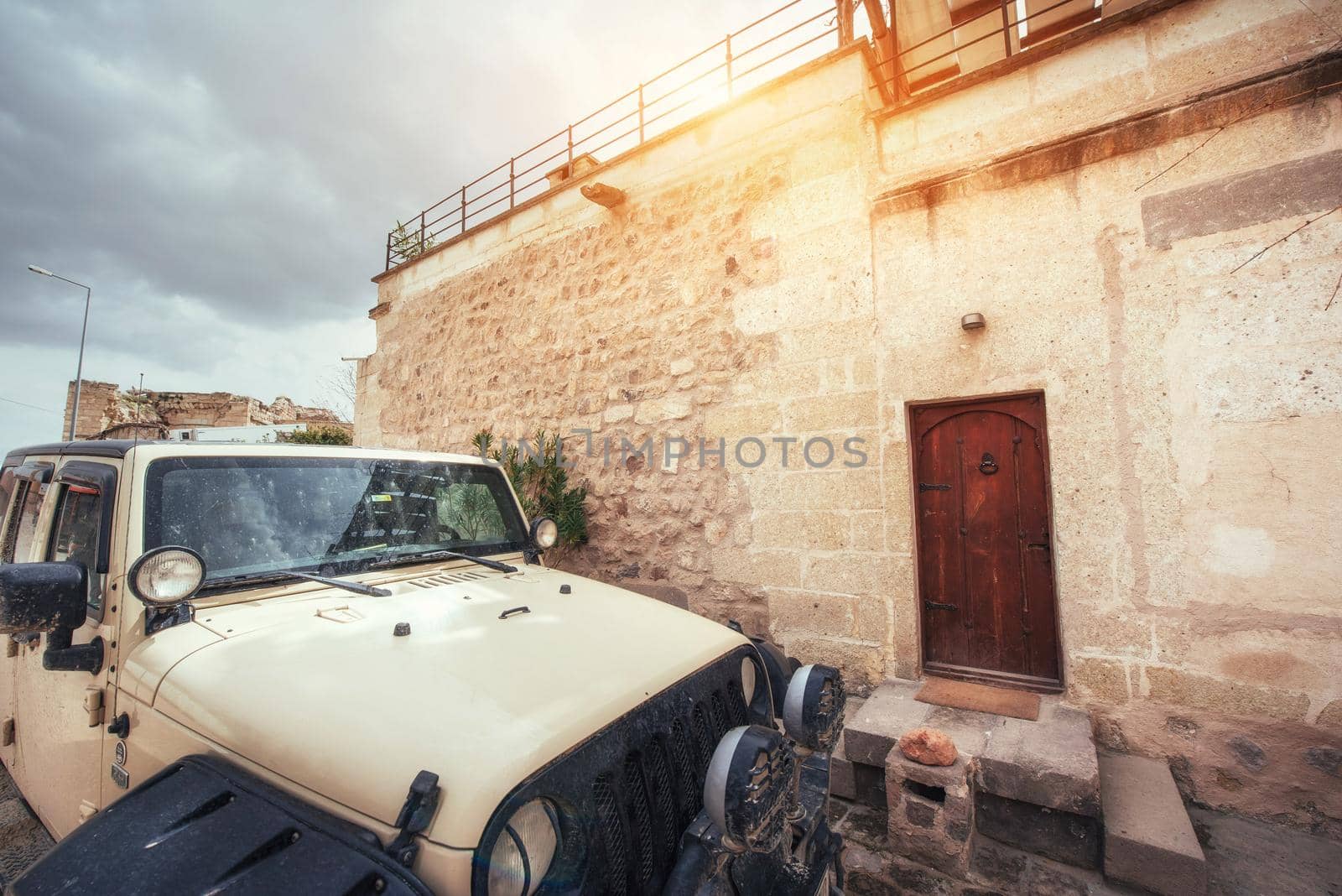 Old traditional Ottoman house in the background.