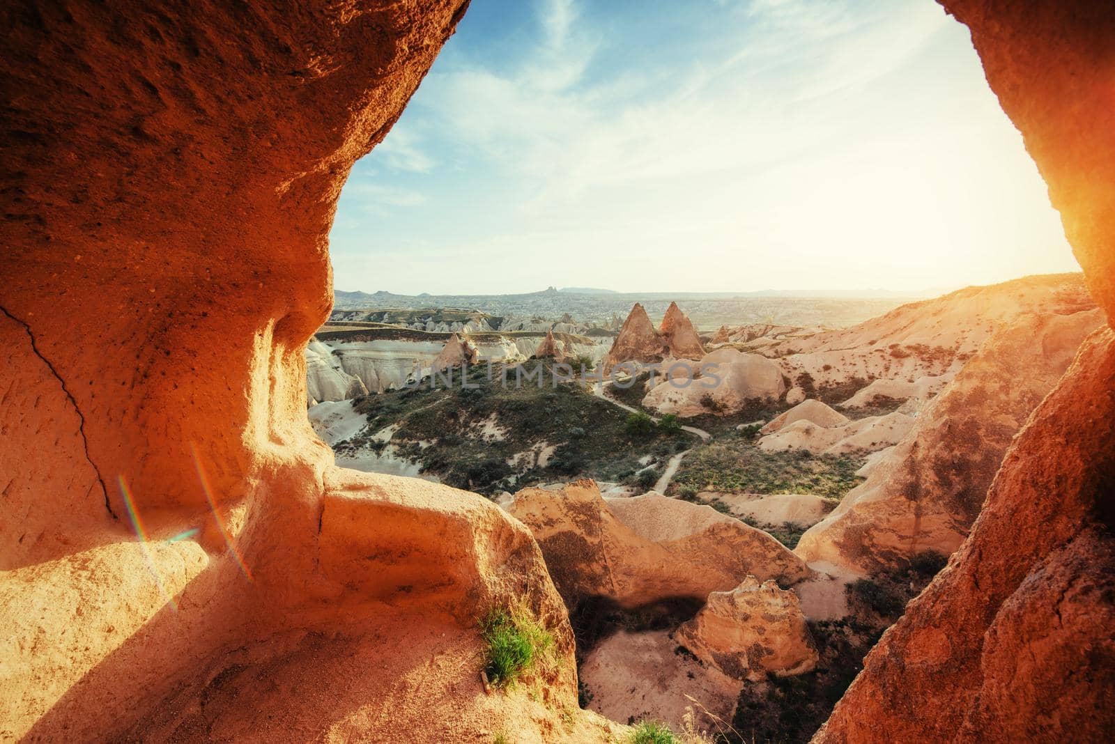 Fantastic sunrise over the Red Valley in Cappadocia, Anatolia, Turkey. Volcanic mountains in Goreme National Park.