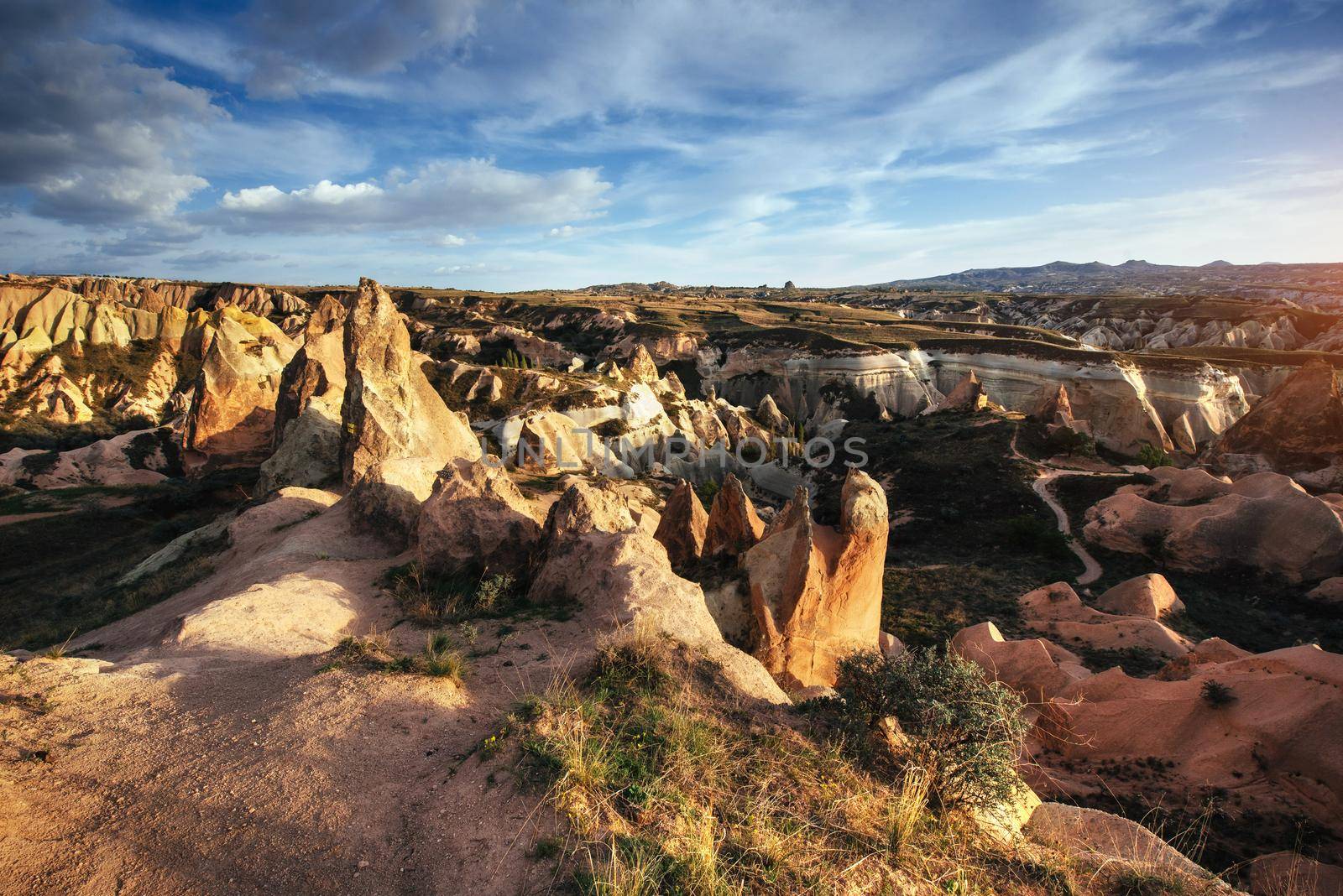 TUnique geological formations in valley in Cappadocia.