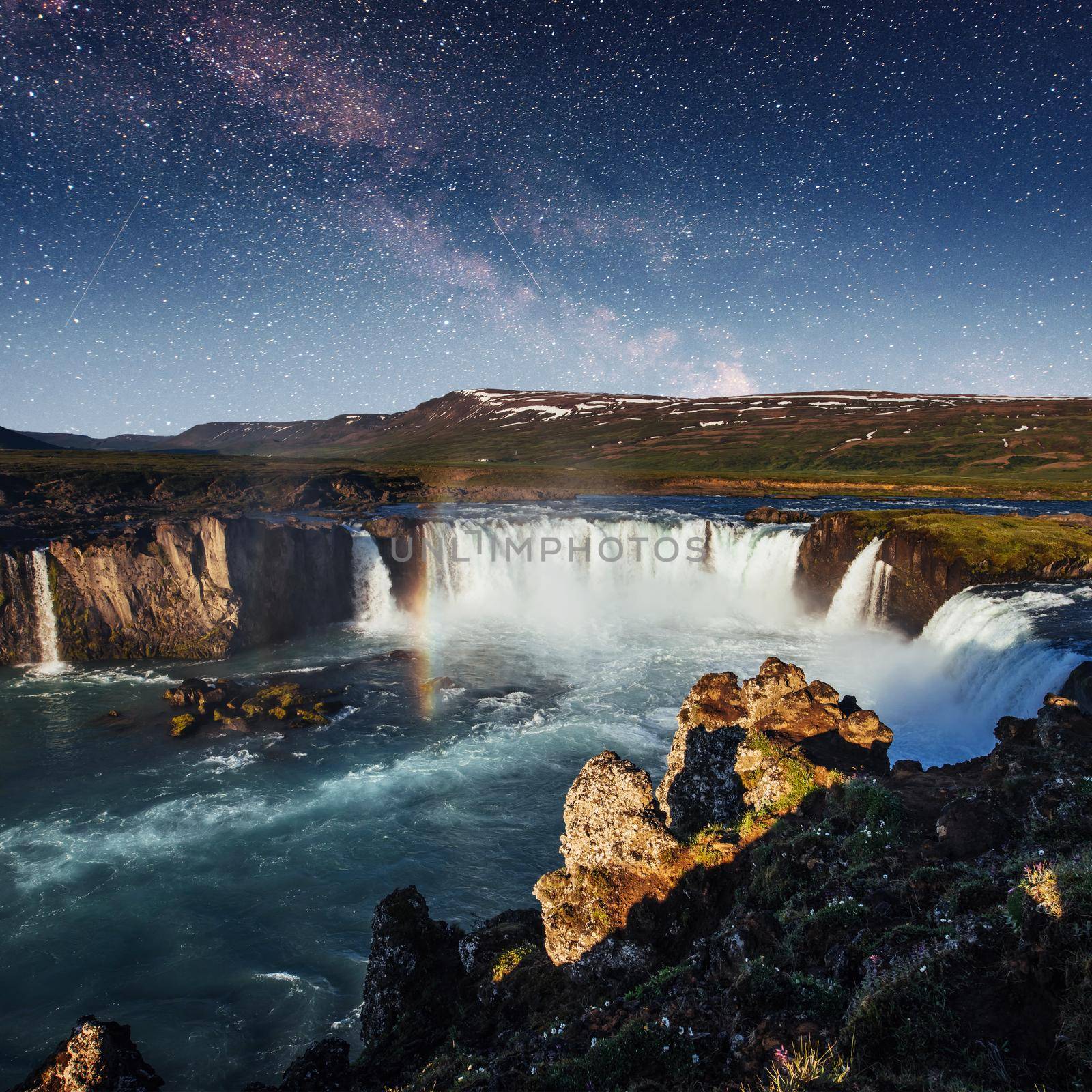 Hodafoss very beautiful Icelandic waterfall. It is located in the north near Lake Myvatn and the Ring Road. Fantastic starry sky and the milky way.