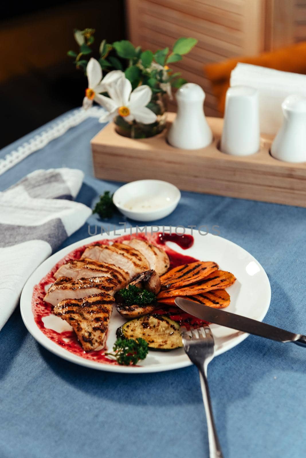 Grilled vegetables and chicken fillet. Traditional cuisine. Grill kitchen.