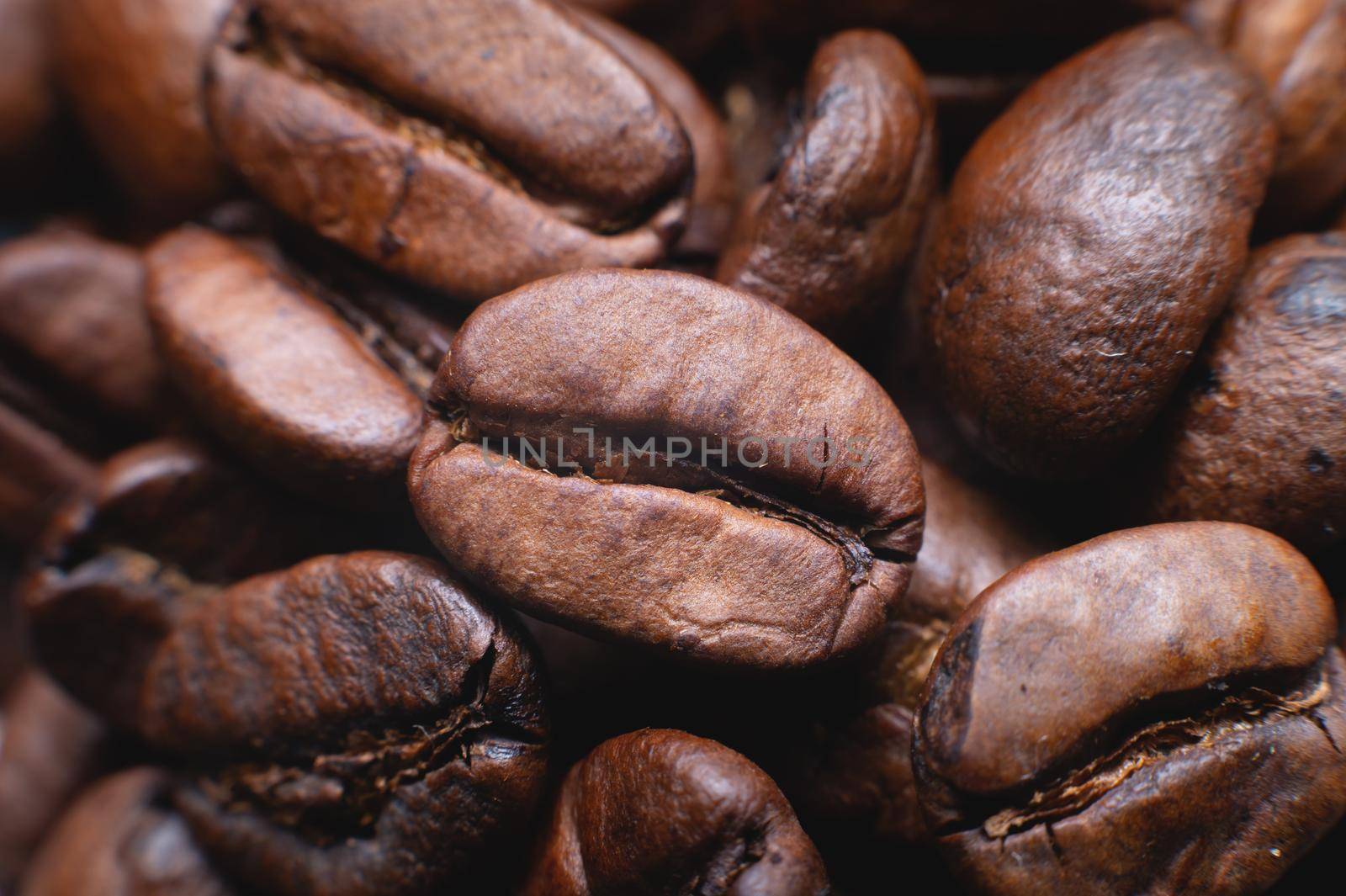 Coffee beans close up for background in shallow depth of field. macro photography by yanik88