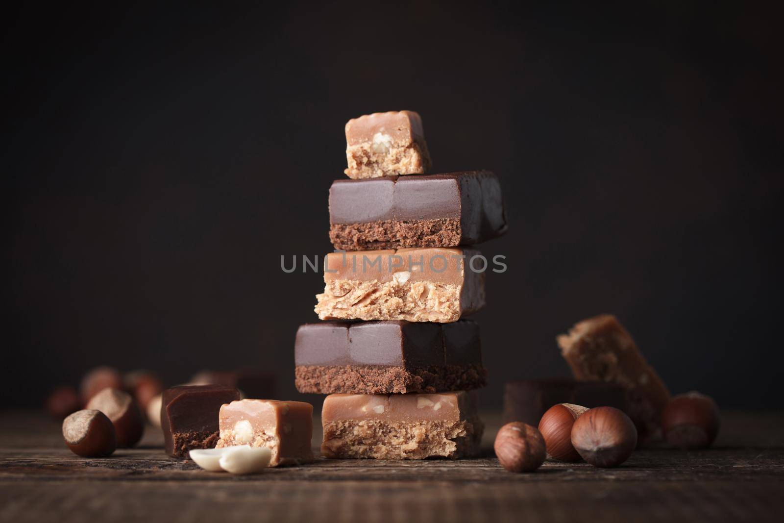 Chocolate and caramel toffee on a dark background