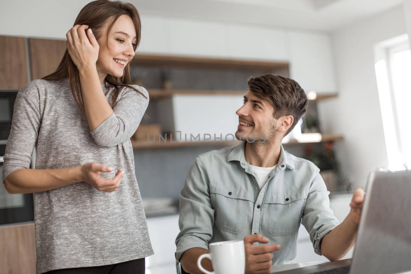 close up. Young couple looking at laptop screen by asdf