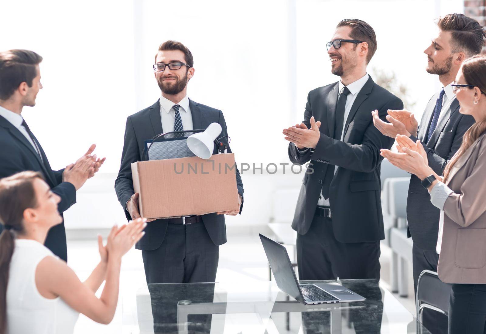 business team applauding at a meeting with the new employee.photo with copy space