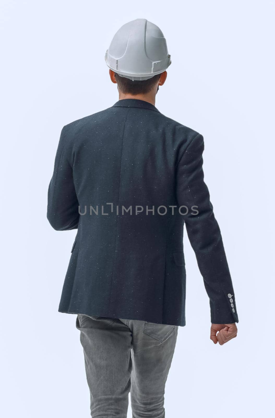 in full growth. male architect confidently stepping forward . isolated on white background