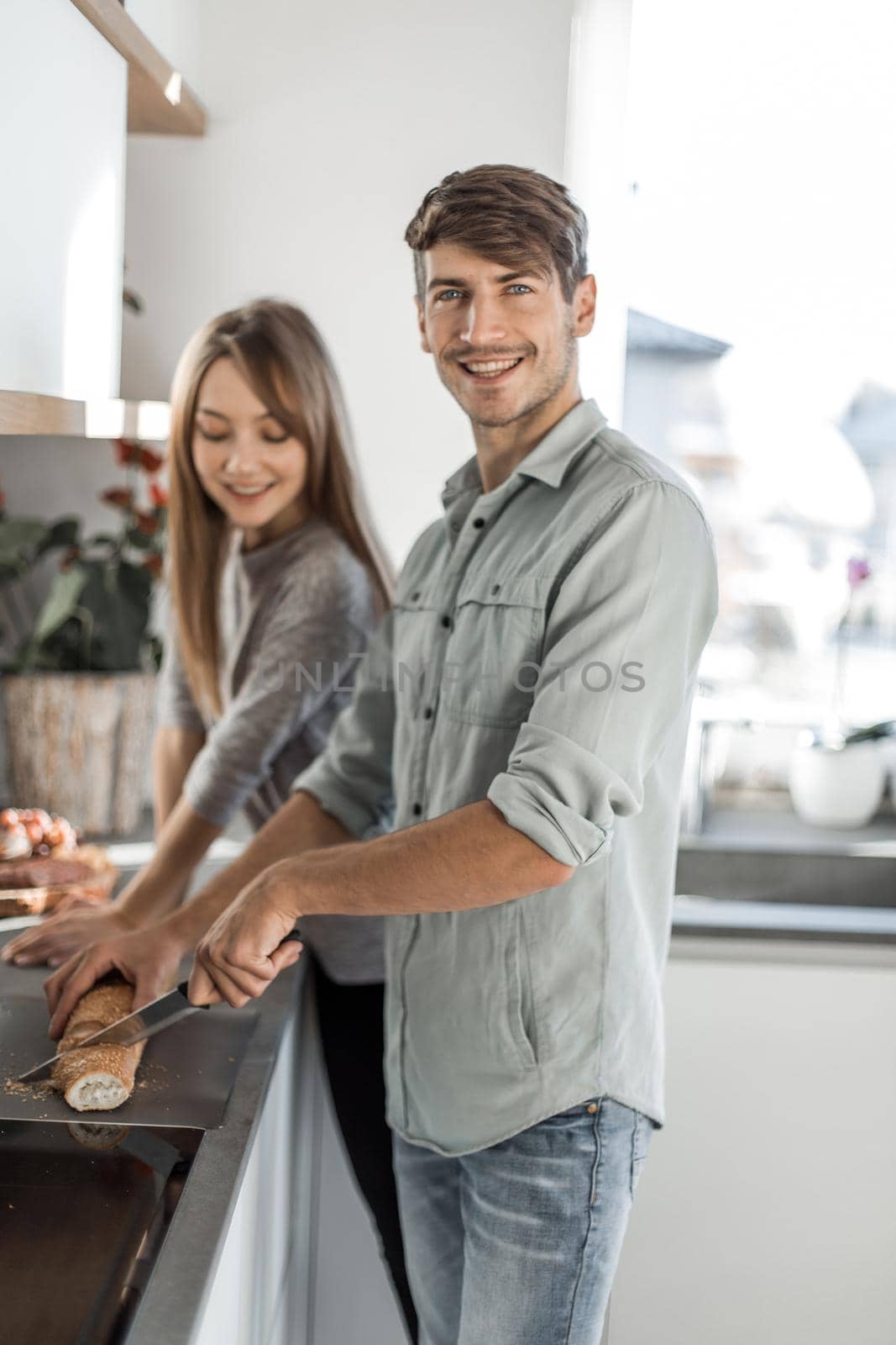 modern young couple enjoys cooking Breakfast together.