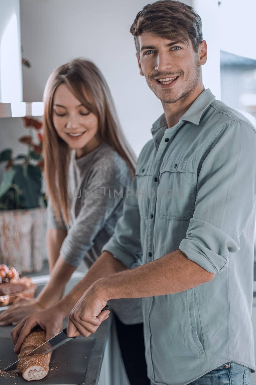 modern young couple enjoys cooking Breakfast together.