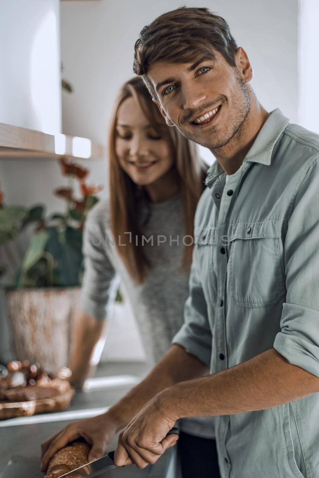 modern young couple enjoys cooking Breakfast together.