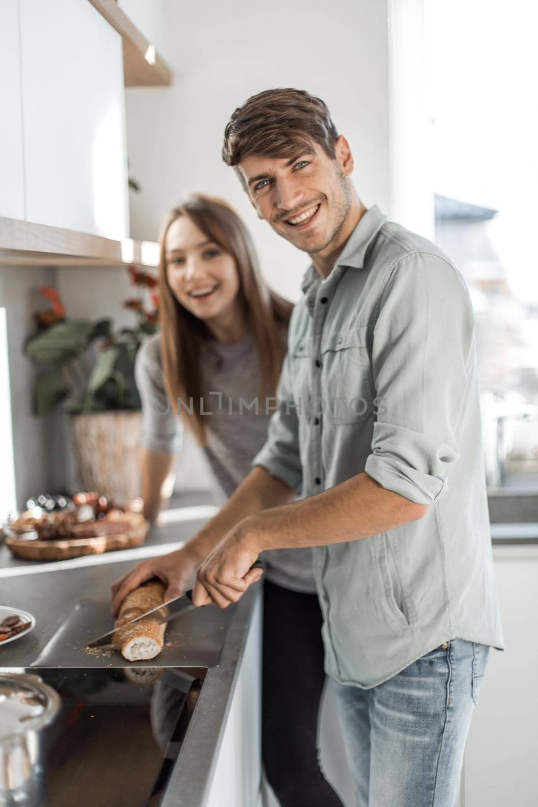 modern young couple enjoys cooking Breakfast together.