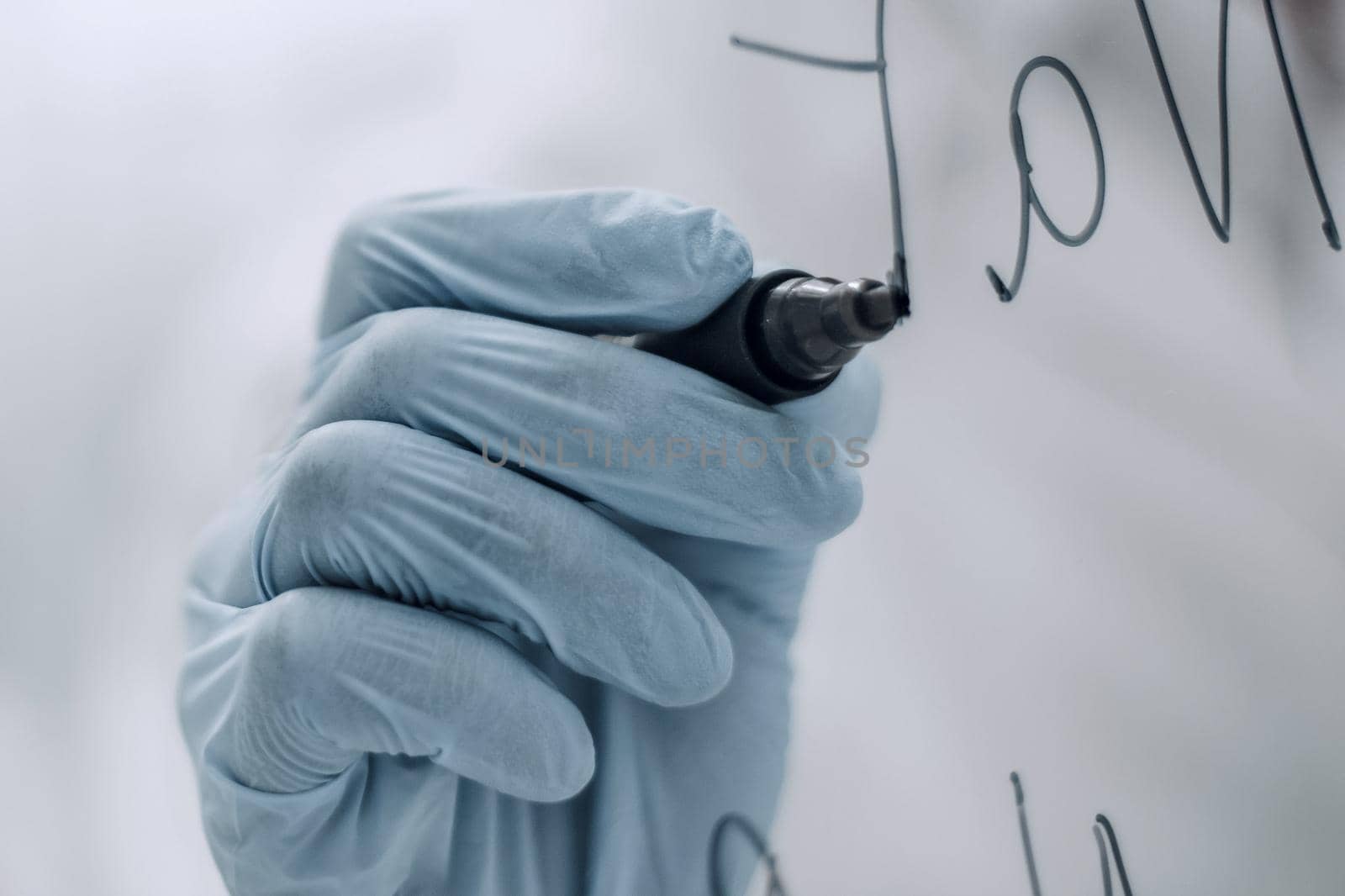 background image.scientist standing behind a glass Board.photo with copy space