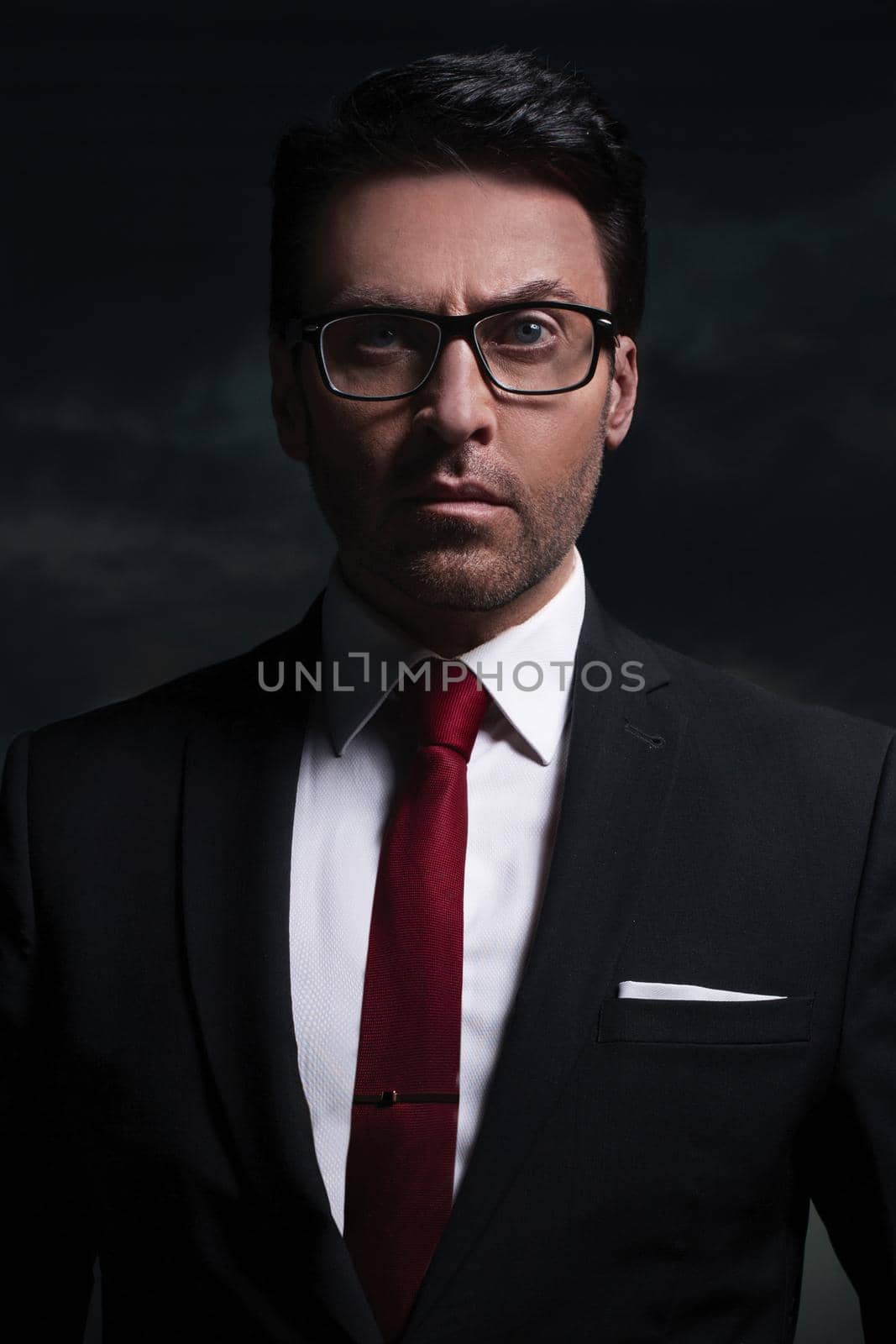 close up.portrait of a serious businessman by asdf