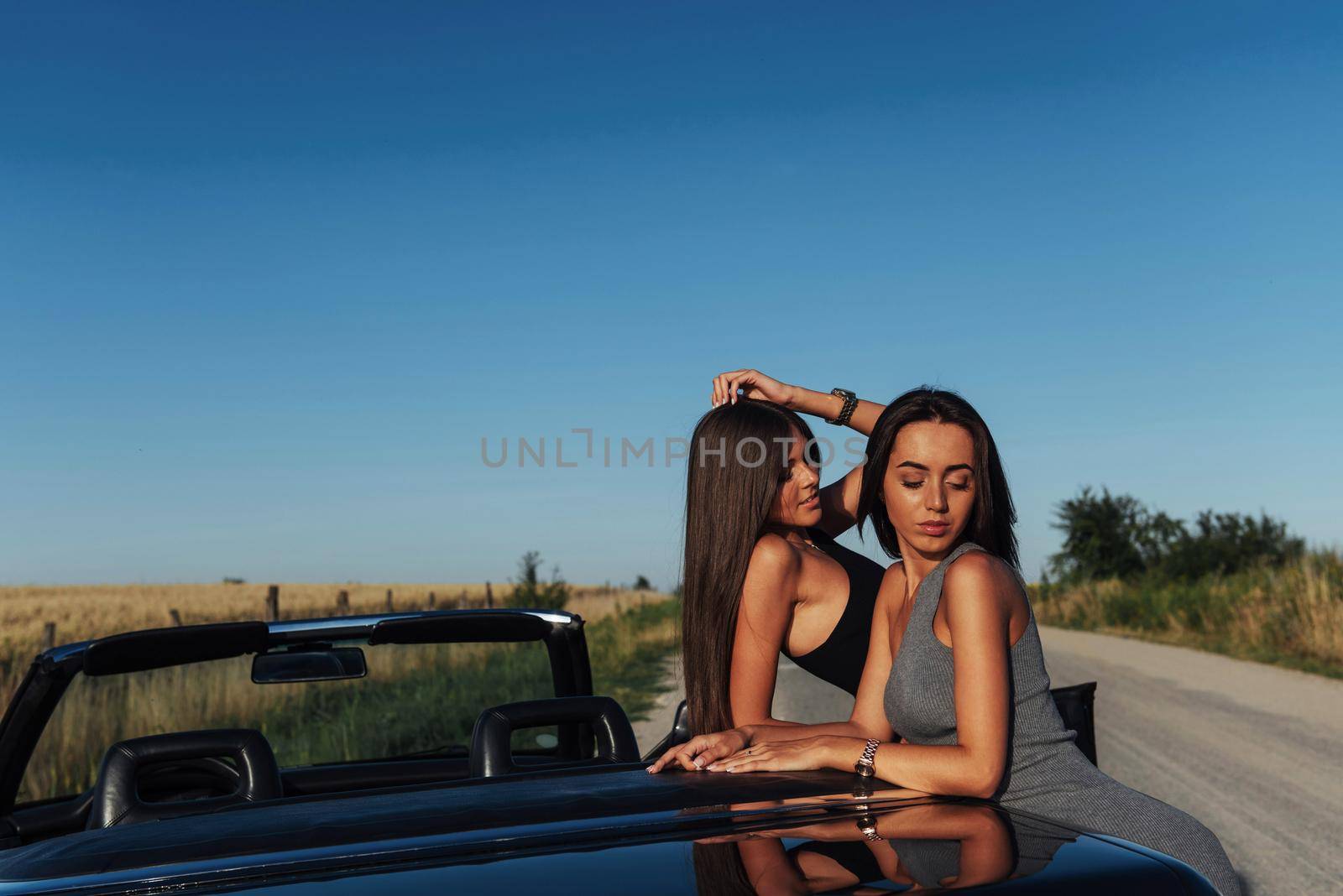 Young women at a photo shoot. by Standret