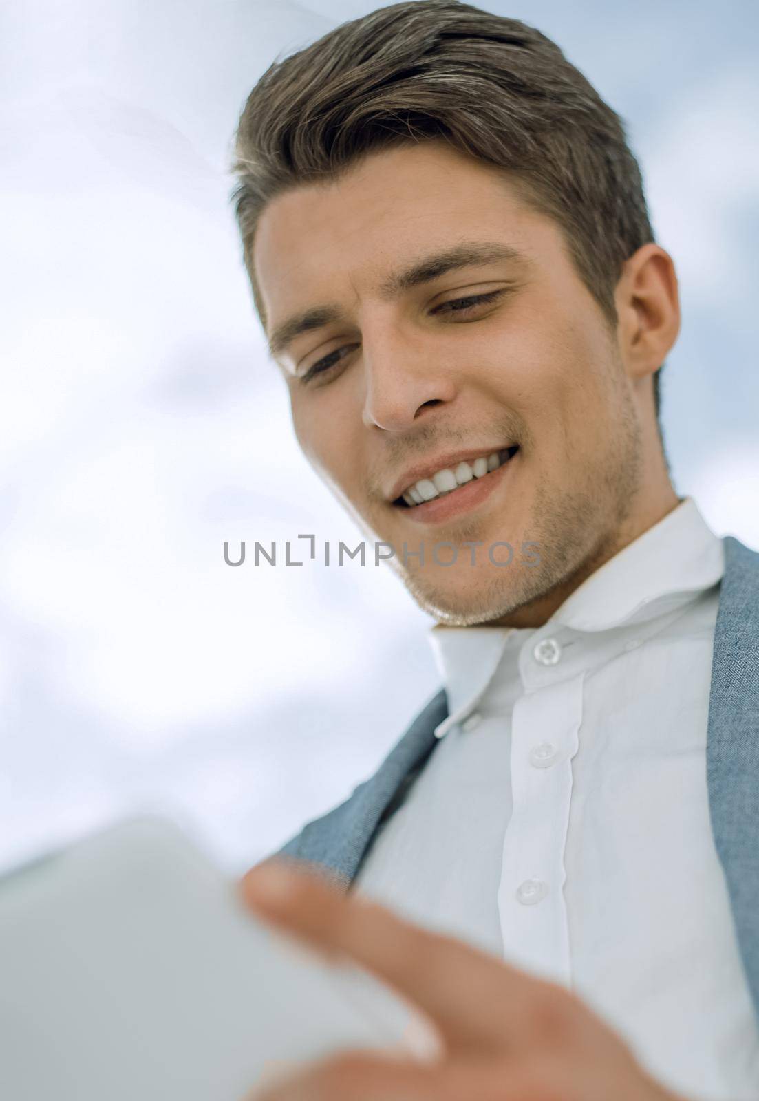close up.businessman with digital tablet by asdf