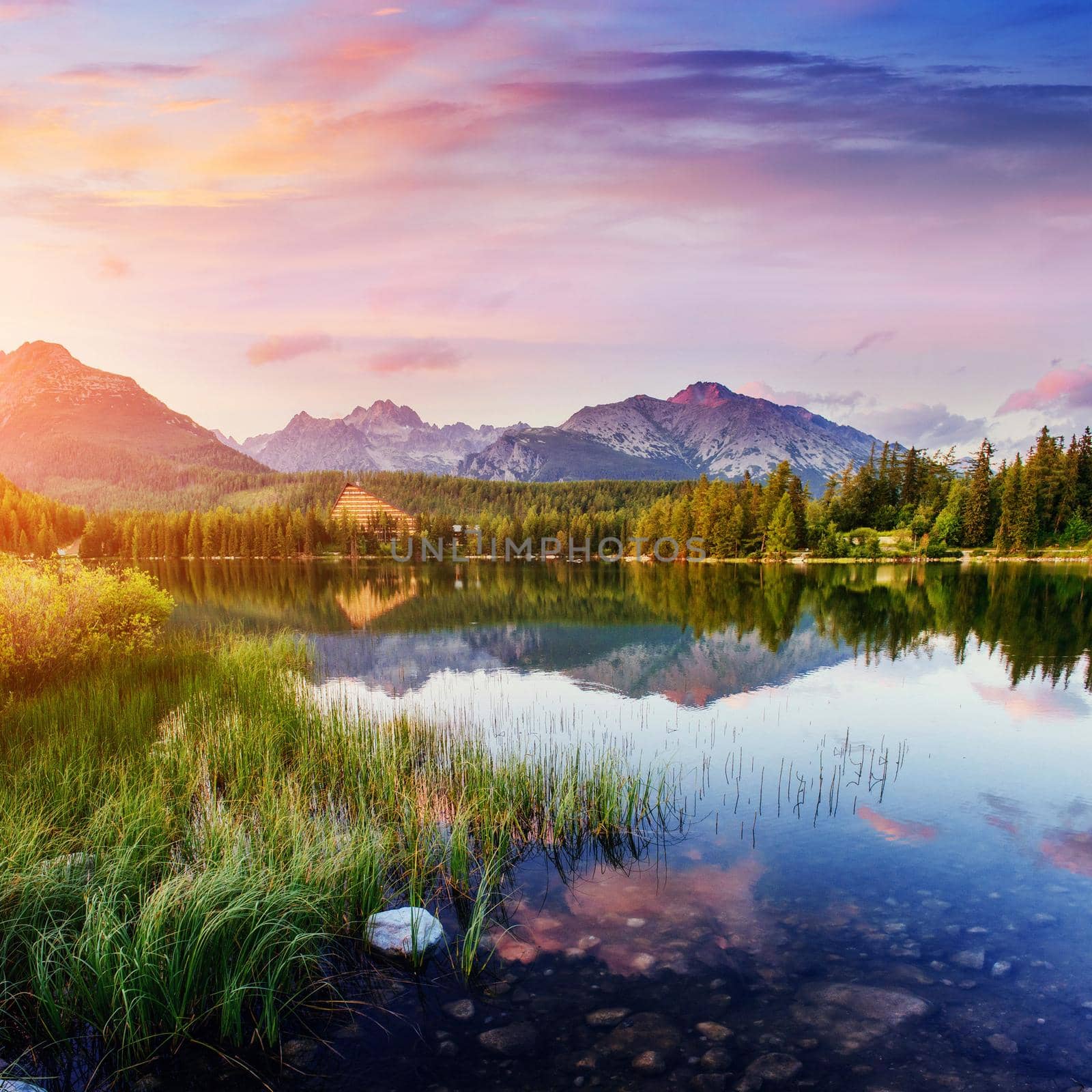 Majestic mountain lake in National Park High Tatra. Strbske pleso, Slovakia, Europe.