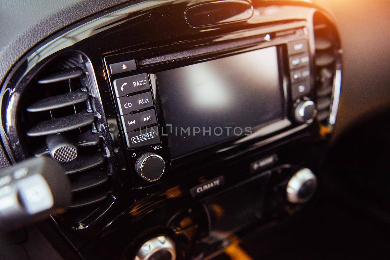 Car audio system front panel. of beautiful modern car close up in the cabin.