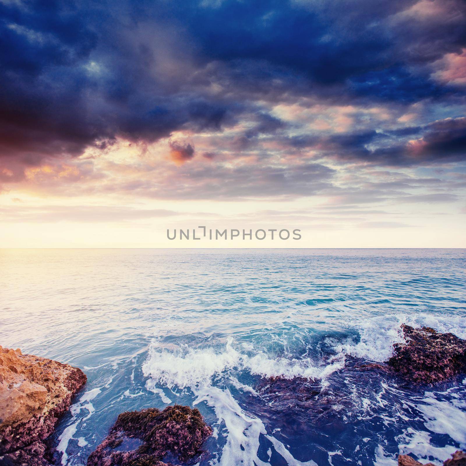 Fantastic view of the nature reserve Monte Cofano. Dramatic scene. Sunset over sea. Location cape San Vito. Sicilia, Italy, Europe. Mediterranean and Tyrrhenian sea.