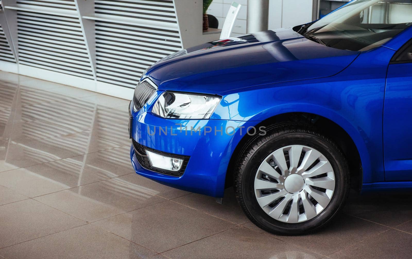 The headlights and hood Blue sports car.