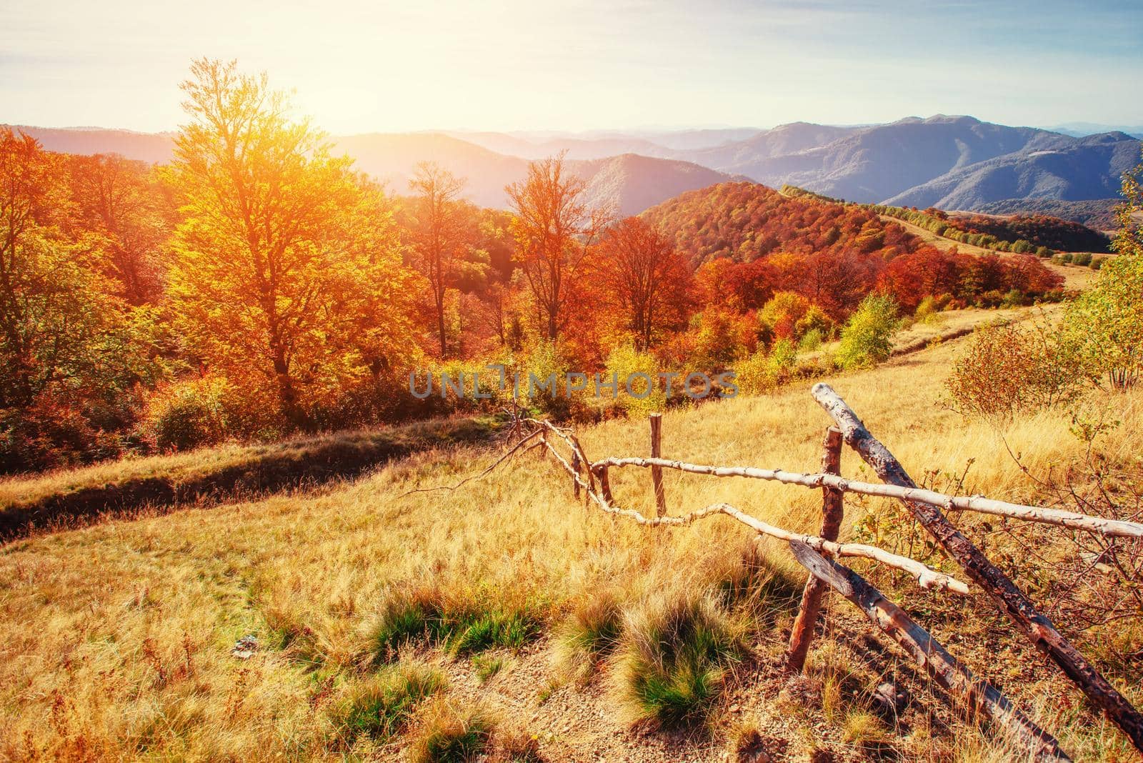 mountain range in the Carpathian Mountains in the autumn season. Fantastic sunset. Ukraine, Europe.