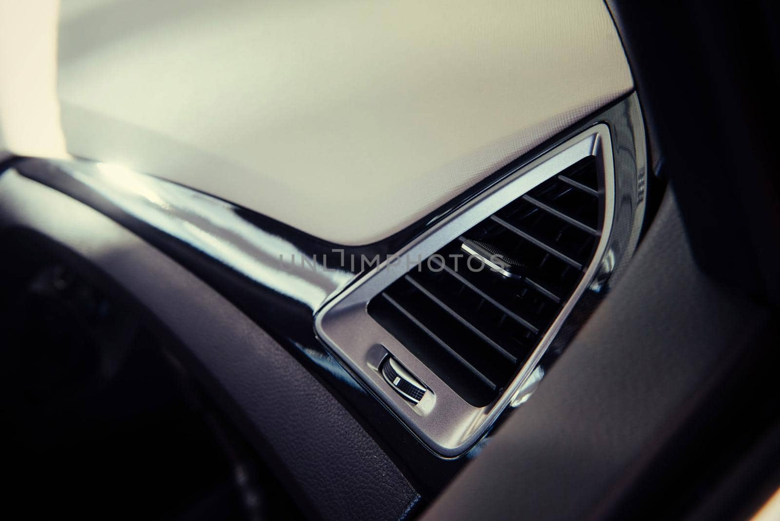 Modern car interior dashboard and steering wheel