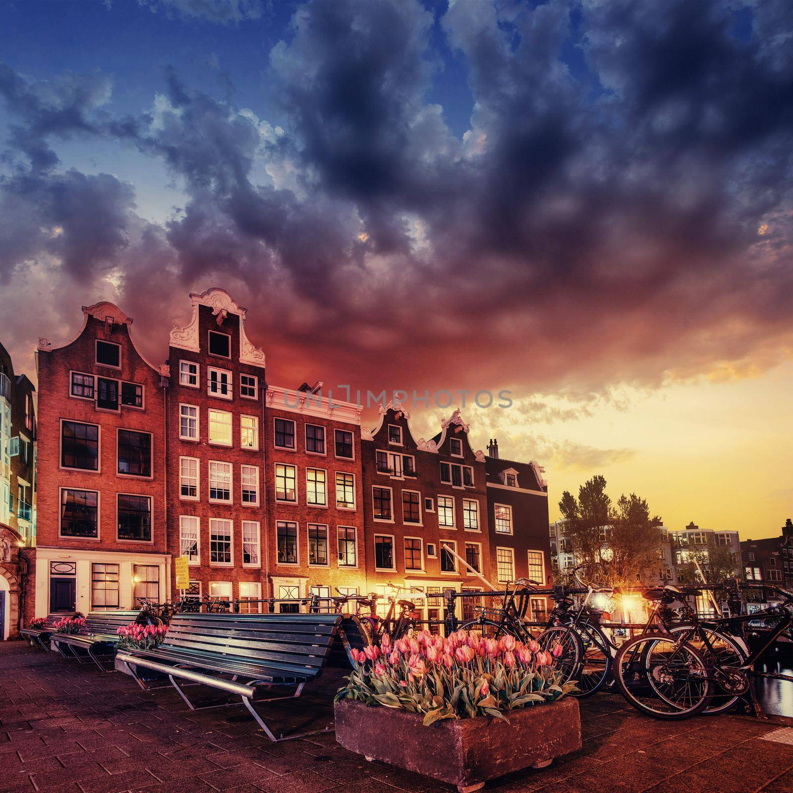 Amsterdam canal on the west. Amsterdam is the capital and most densely populated city in the Netherlands.