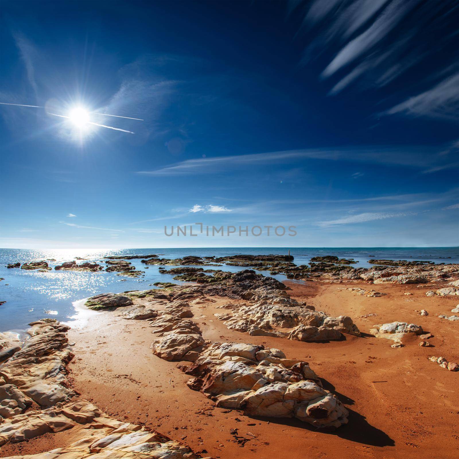 Fantastic view of the nature reserve Monte Cofano. Dramatic scene. Sunset over sea. Location cape San Vito. Sicilia, Italy, Europe. Mediterranean and Tyrrhenian sea.