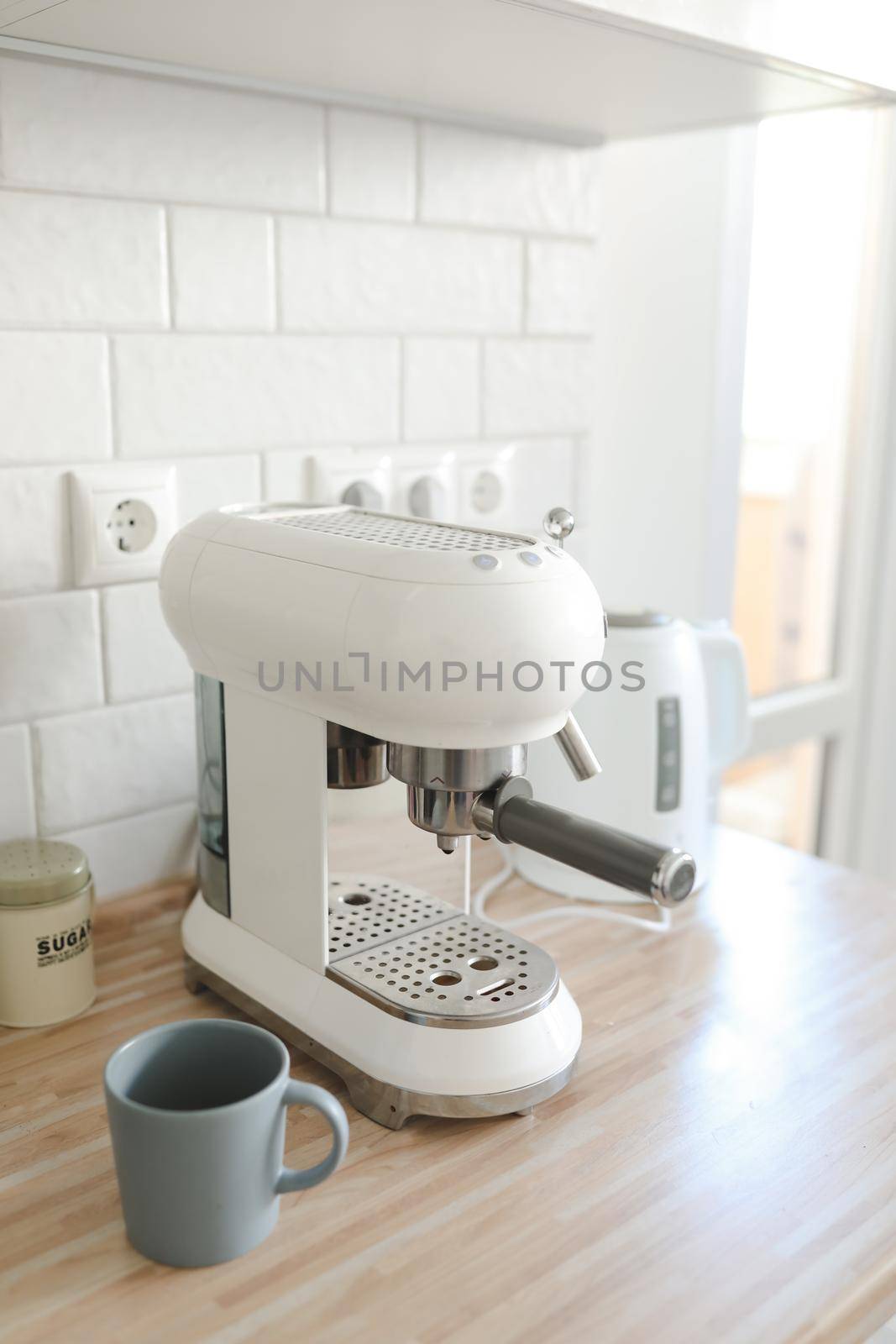 white stylish coffee machine in cozy kitchen interior by paralisart