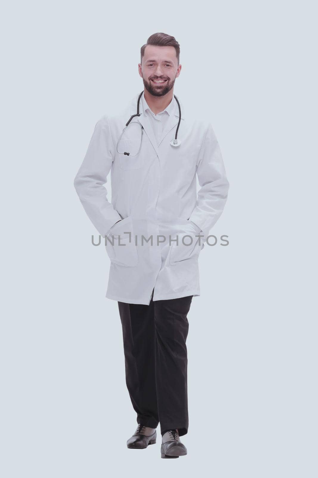 in full growth. a successful doctor is a therapist with a stethoscope .isolated on white