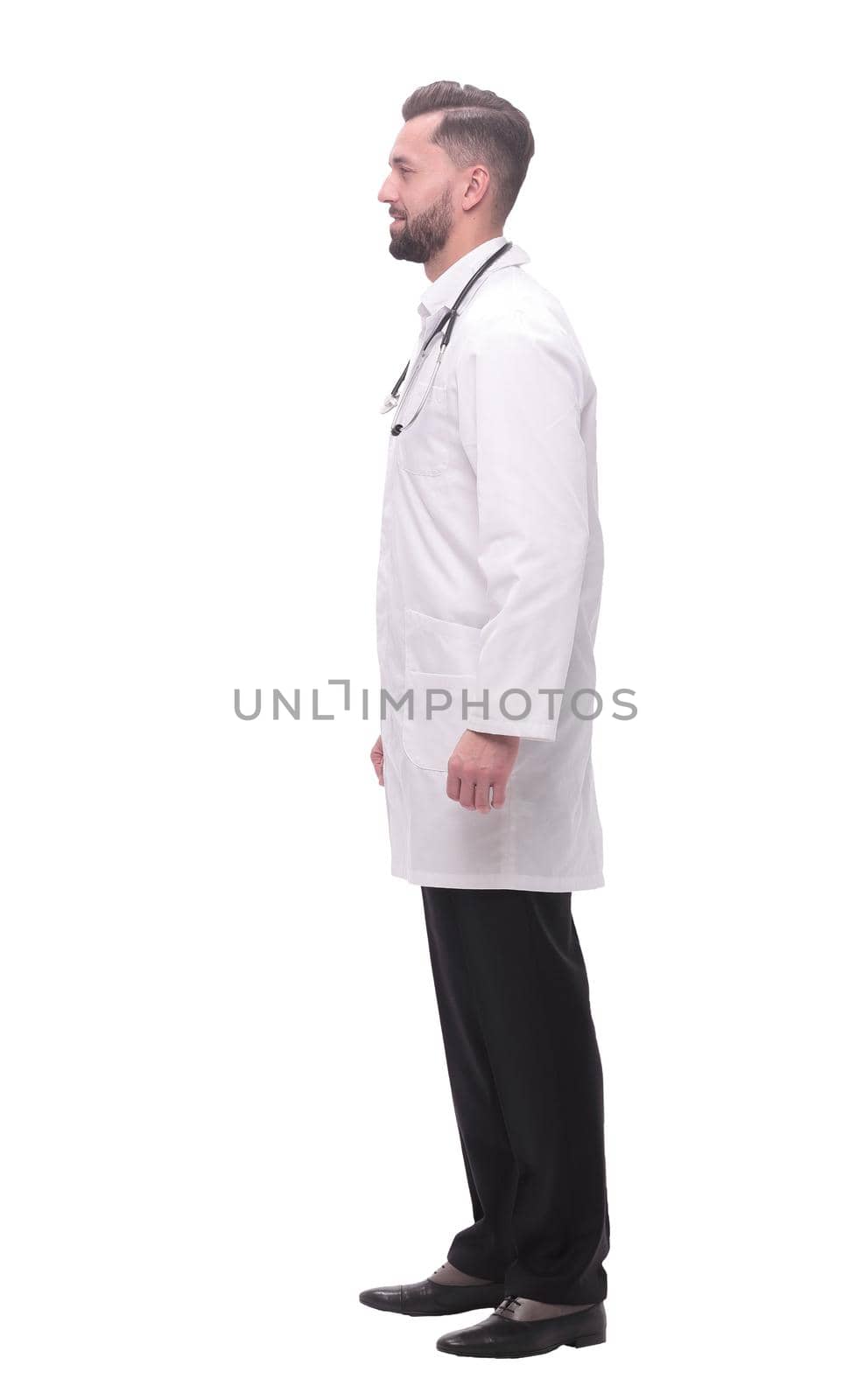 side view. smiling pediatrician doctor with stethoscope .isolated on white