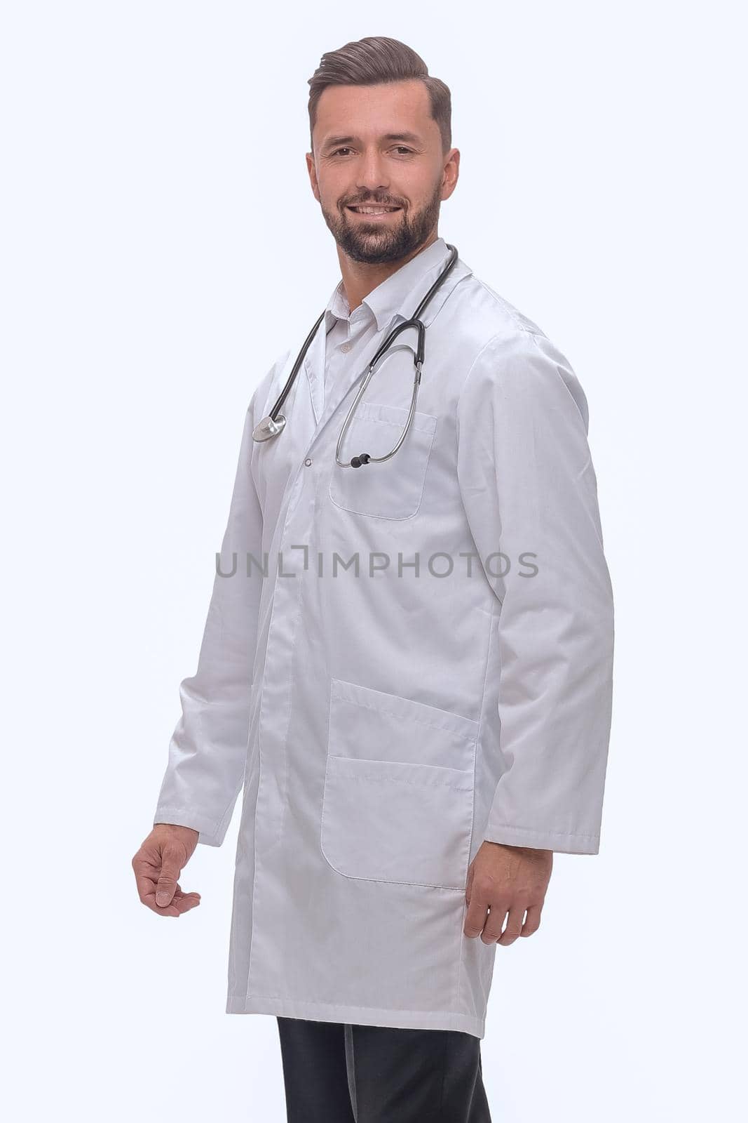 in full growth. medical professional with stethoscope .isolated on white background